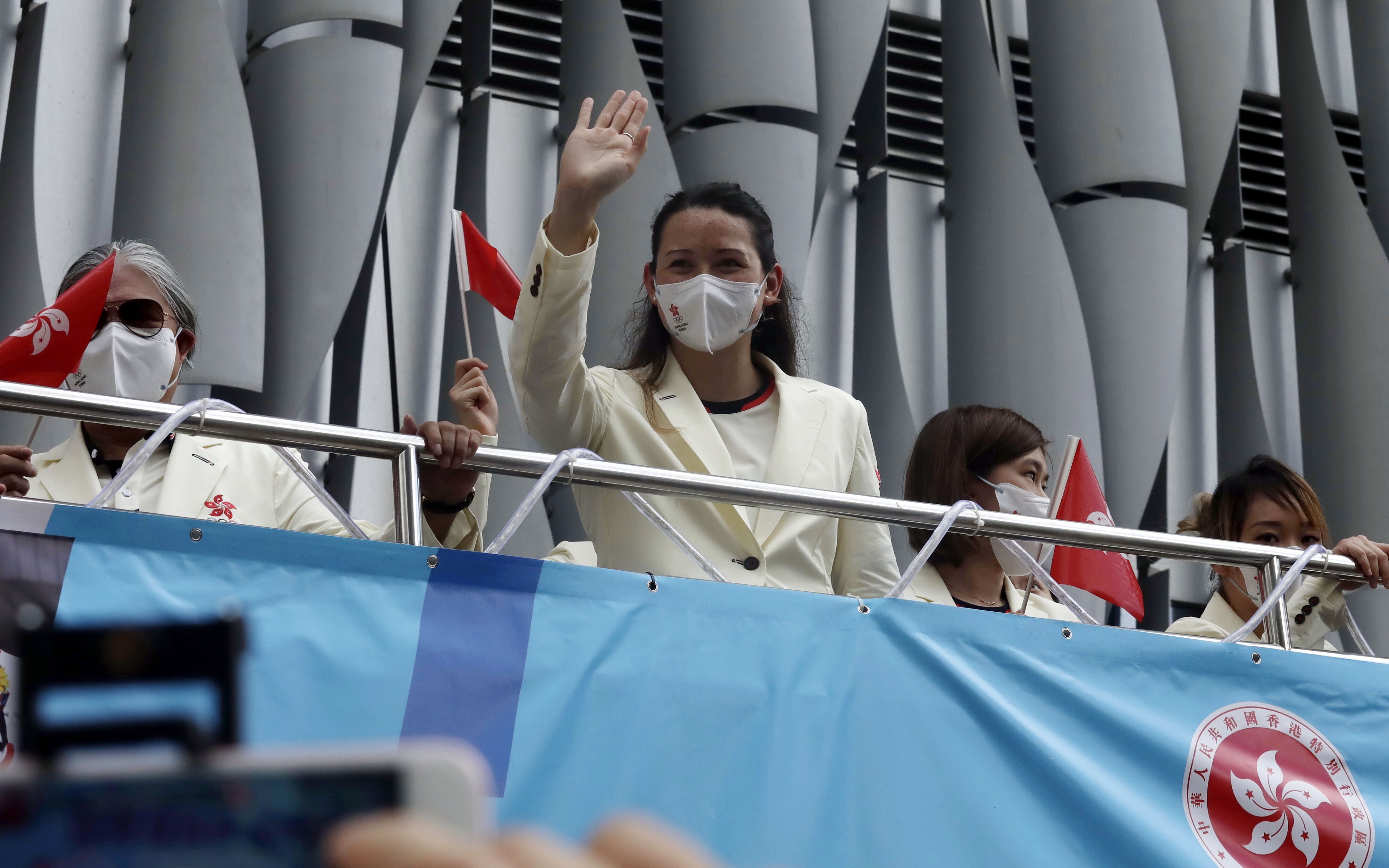 Swimmer Siobhan Haughey waves during a parade for the Hong Kong Tokyo 2020 Olympic Games delegation. Photo: Jonathan Wong