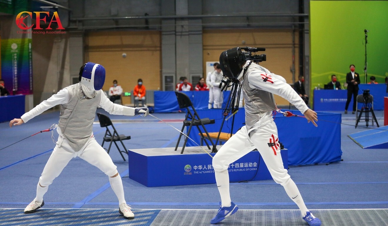 Hong Kong's Cheung Siu-lun (right) in the match against Fukien. Photo: Chinese Fencing Association