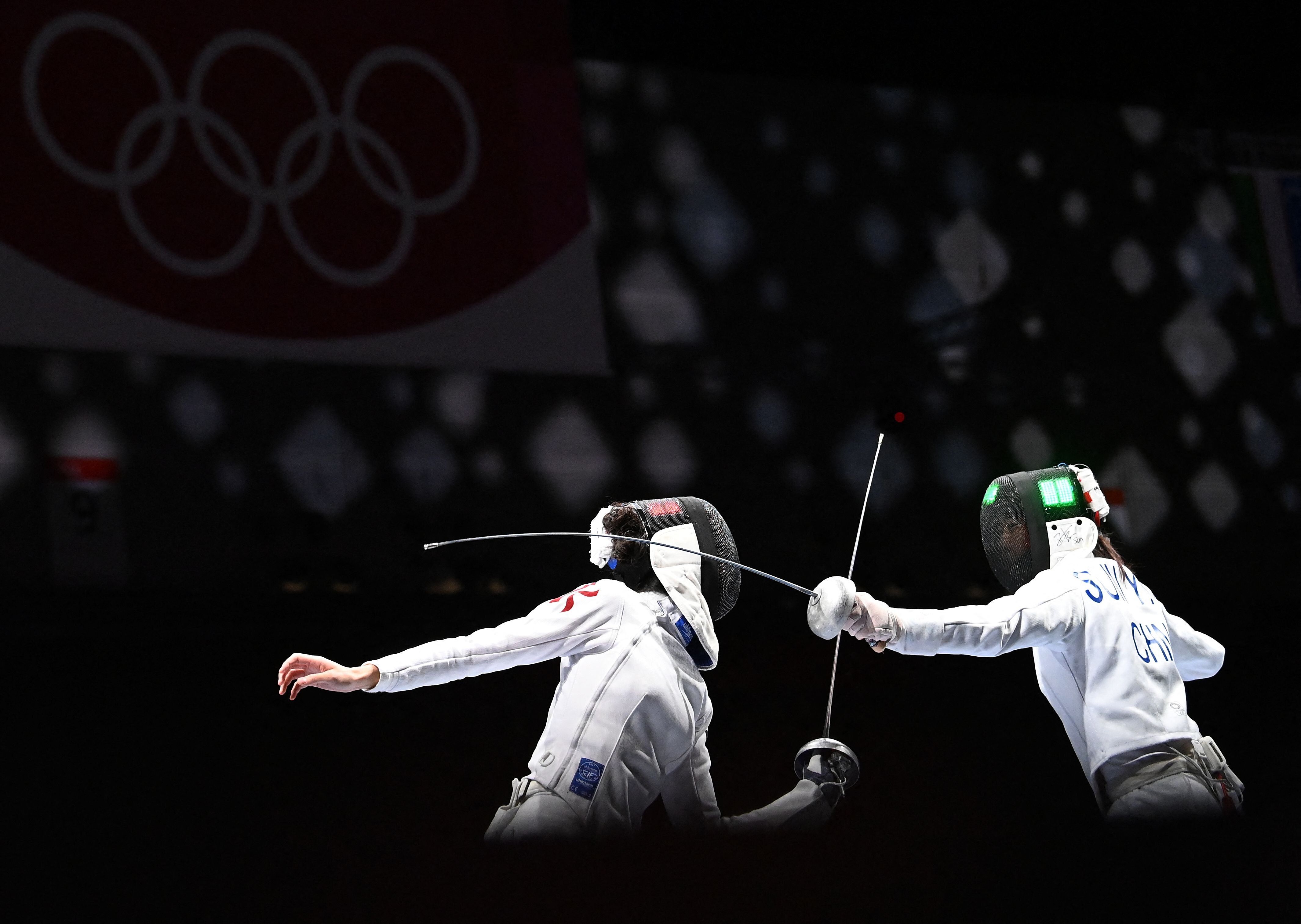 Hong Kong’s Vivian Kong Man-wai against Sun Yiwen of China in the team épée at the Tokyo 2020 Olympic Games in the Makuhari Messe Hall in July. Photo: AFP