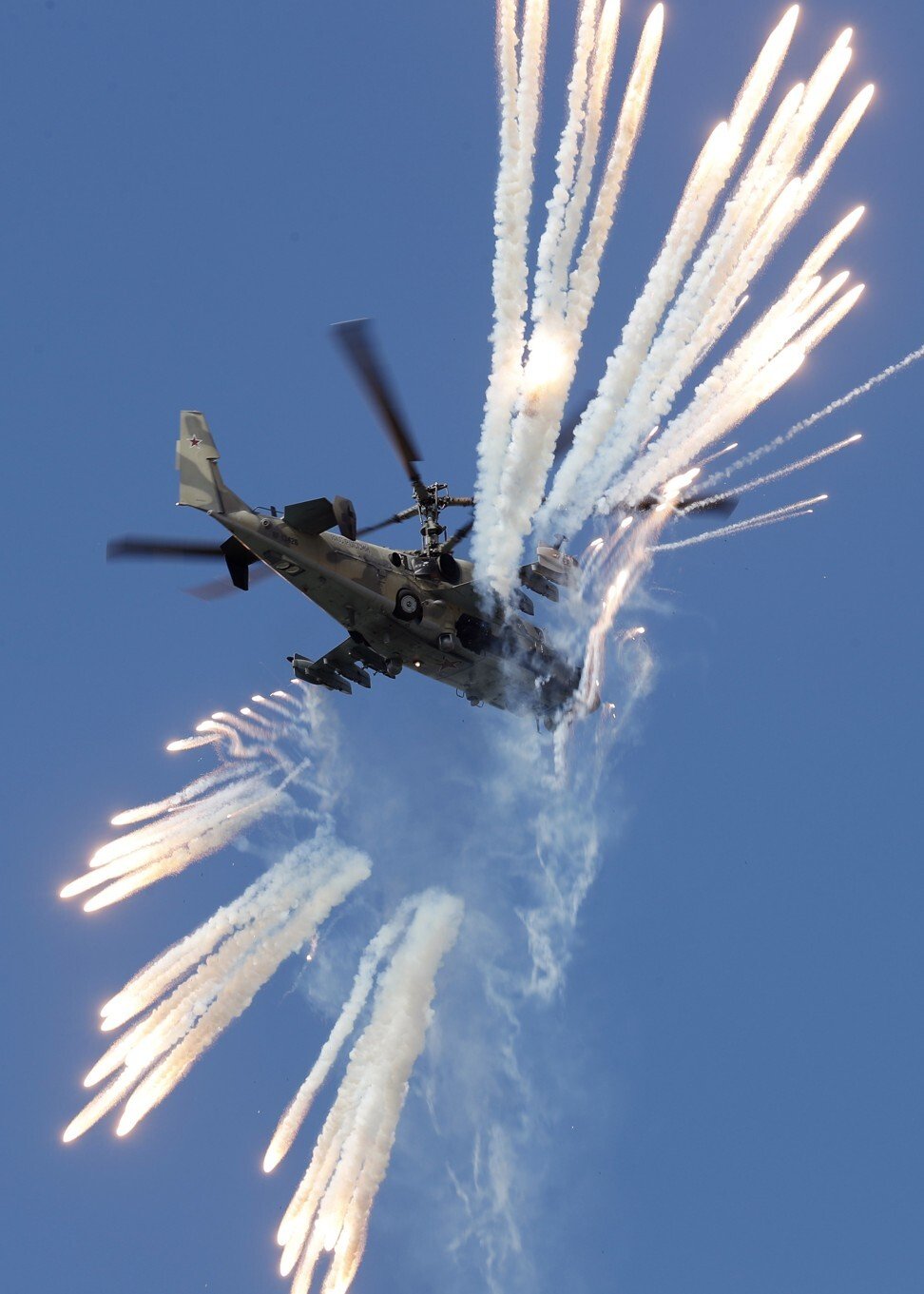 A Russian Ka 52 Alligator reconnaissance and combat helicopter performs during the MAKS 2019 International Aviation and Space Salon in Zhukovsky outside Moscow in 2019. Photo: EPA-EFE