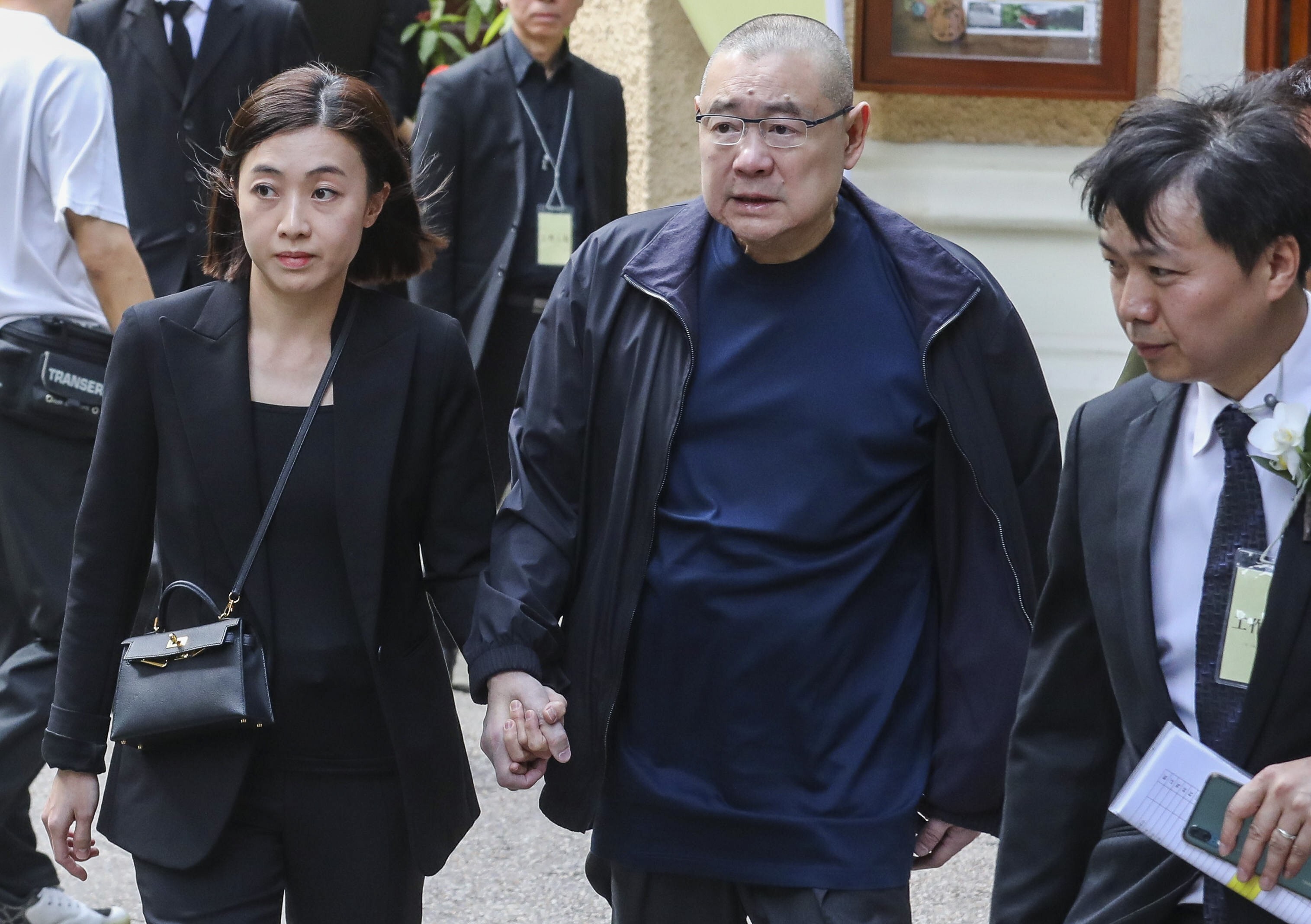 Joseph Lau Luen-hung (right) and his wife Chan Hoi-wan (left) at the funeral service of the real estate tycoon Walter Kwok Ping-sheung, at St. John’s Cathedral in Central on 1 November 2018. Photo: Felix Wong.