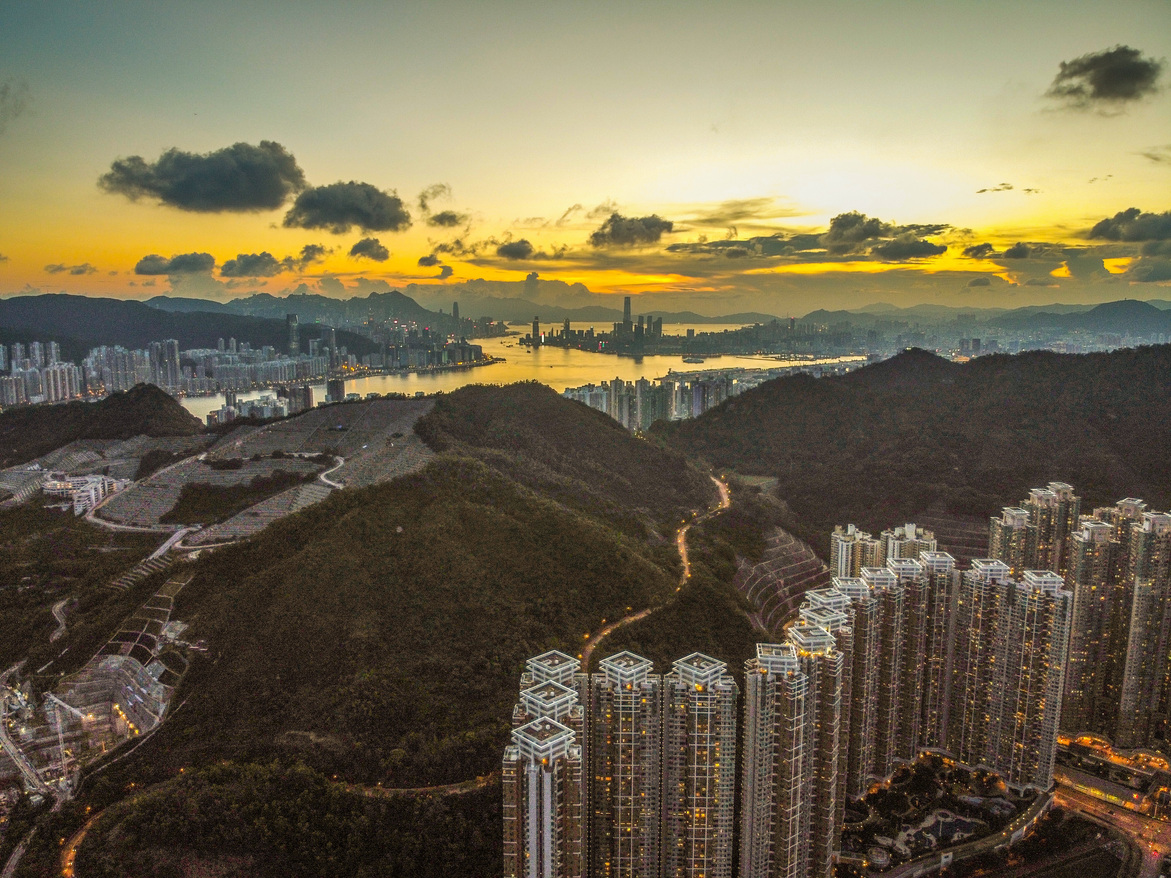 Hong Kong's skyline with residential buildings is seen at sunset in Tseung Kwan O in August 2020. Photo: Sun Yeung