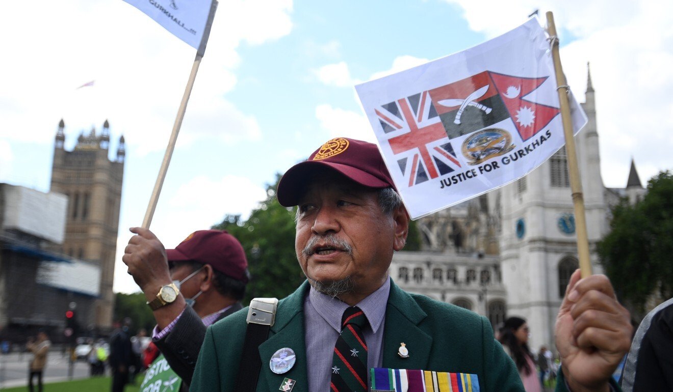 Former British Gurkha soldiers and their families protest outside parliament in London in August. Photo: EPA / Andy Rain