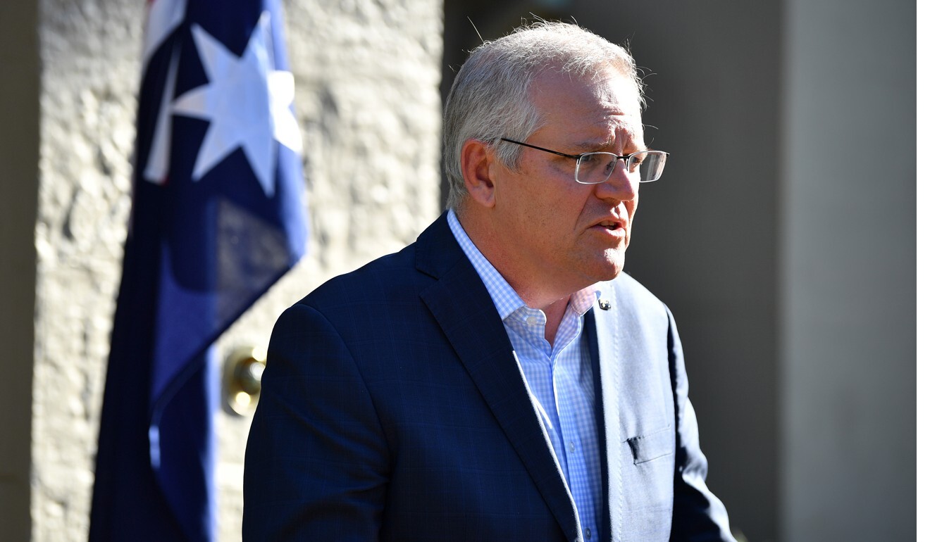 Australian Prime Minister Scott Morrison speaks to the media, defending the decision to ditch a submarine deal with France to acquire nuclear propelled ones from the US instead. Photo: EPA-EFE