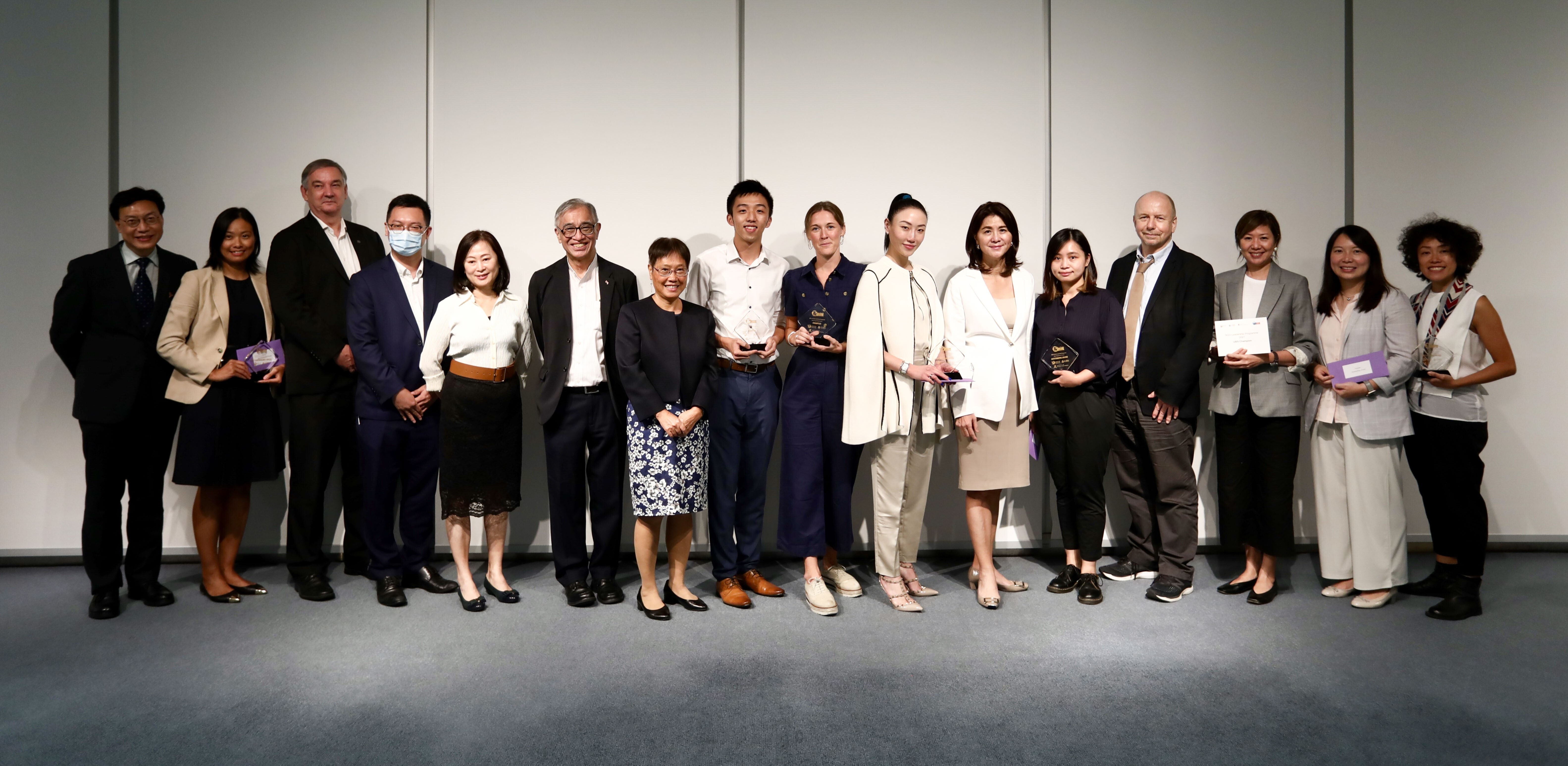 (Left to right) Rob Stewart, UBS head of corporate communications APAC; Ho Kai-ming, undersecretary for labour and welfare; Tammy Tam, SCMP editor-in-chief; Joseph Lee, Wofoo Foundation; Joyce Ma, CUHK’s social work department; Henry Lee, of Teach for Hong Kong; Charlotte Tottenham, from ImpactHK; Nancy Wong, of Karen Leung Foundation; Amy Lo, UBS Hong Kong head and CEO. Photo: Jonathan Wong