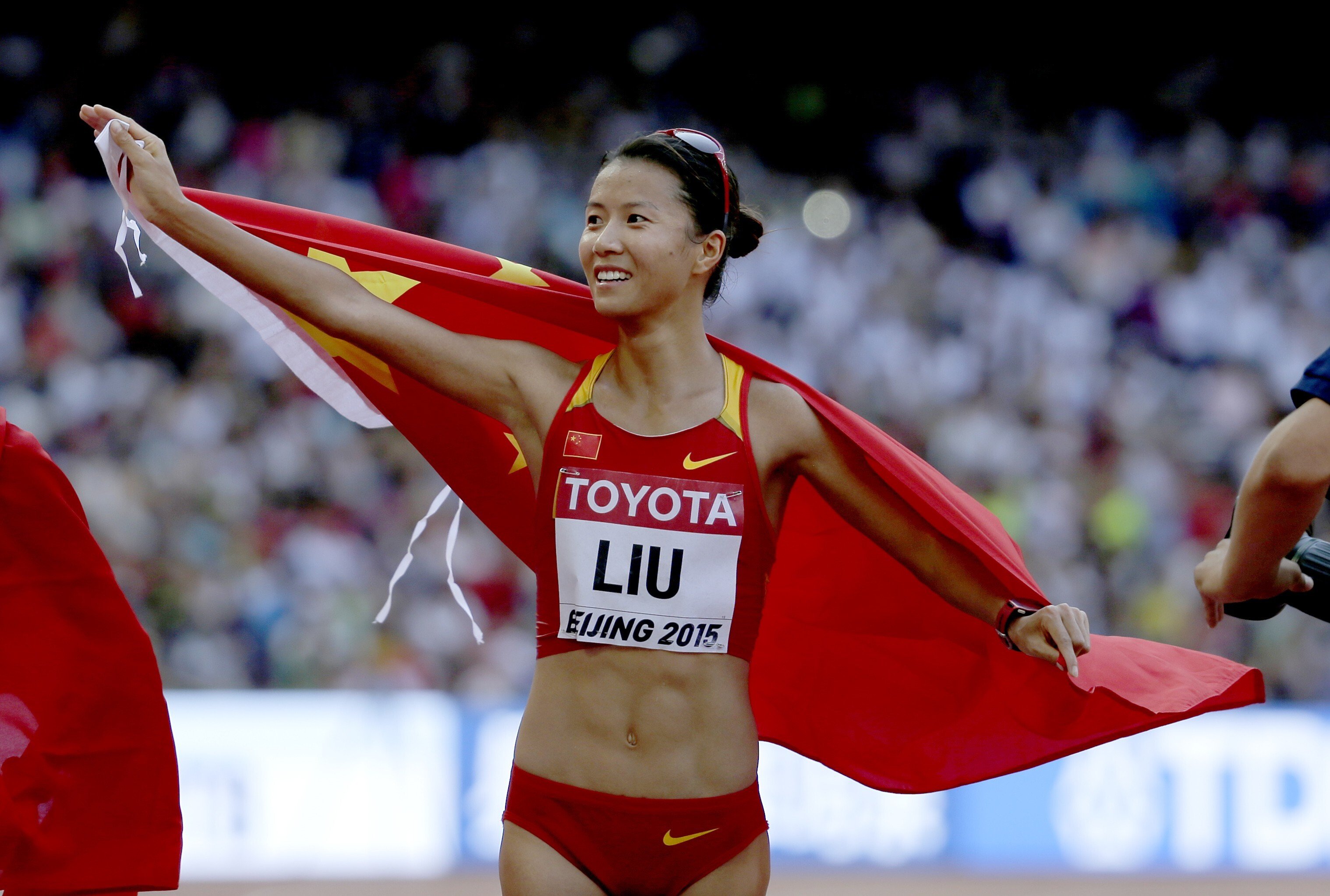 China's Liu Hong celebrates after taking the gold in the women's 20km race walk at the 2015 World Athletics Championships at the Bird's Nest stadium in Beijing. Liu has retired for the second time after finishing fourth at the 2021 China National Games. Photo: AP
