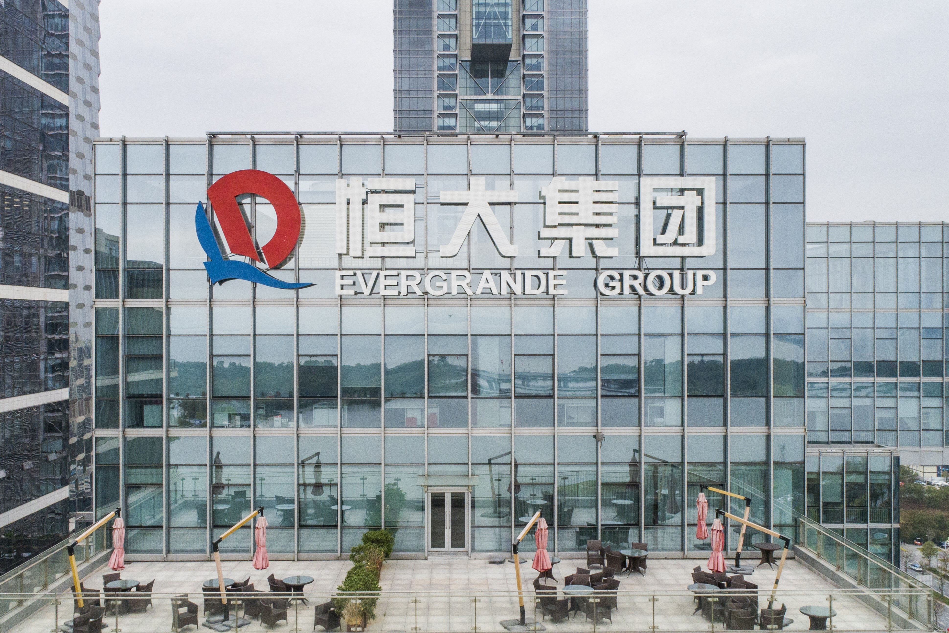 Evergrande’s headquarters in Shenzhen was besieged by retail investors earlier this month. The group’s debt crisis continues to sway market sentiment amid official silence. Photo: Getty Images
