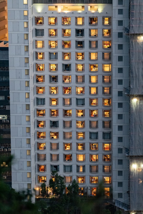 Participants closed out the event by dancing in their windows as evening fell. Photo: Henk Jan Pomstra