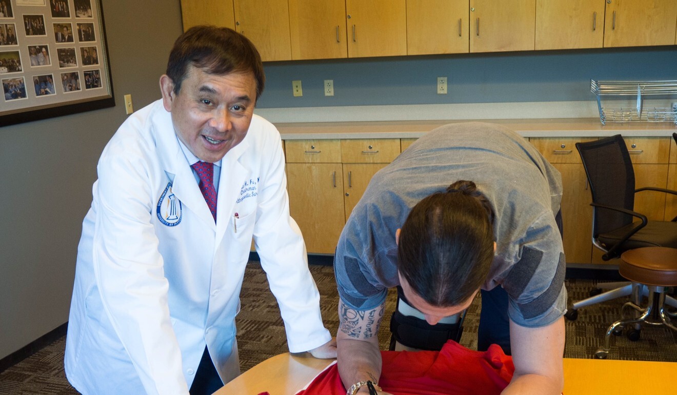 Zlatan Ibrahimovic signs a United shirt for Professor Fu. Photo: Freddie Fu