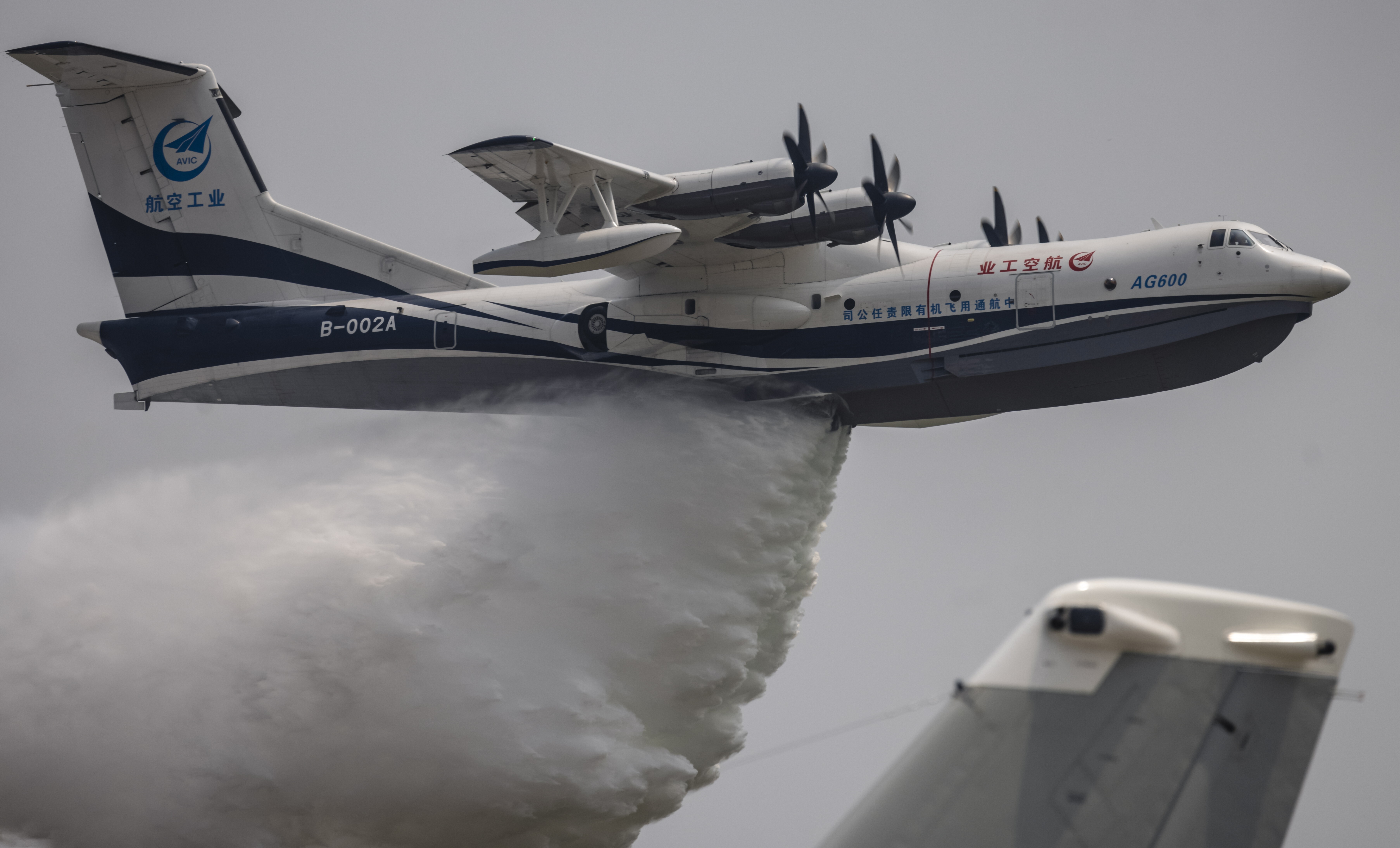 AVIC AG600 amphibious aircraft goes through its paces at the air show in Zhuhai on Tuesday. Photo: EPA-EFE