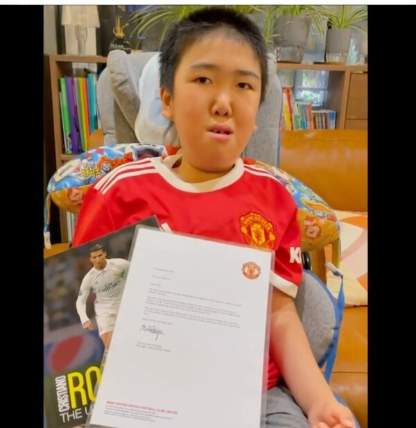 Marcus is a big Manchester United fan and recently received a letter from the manager. Photo: Handout.