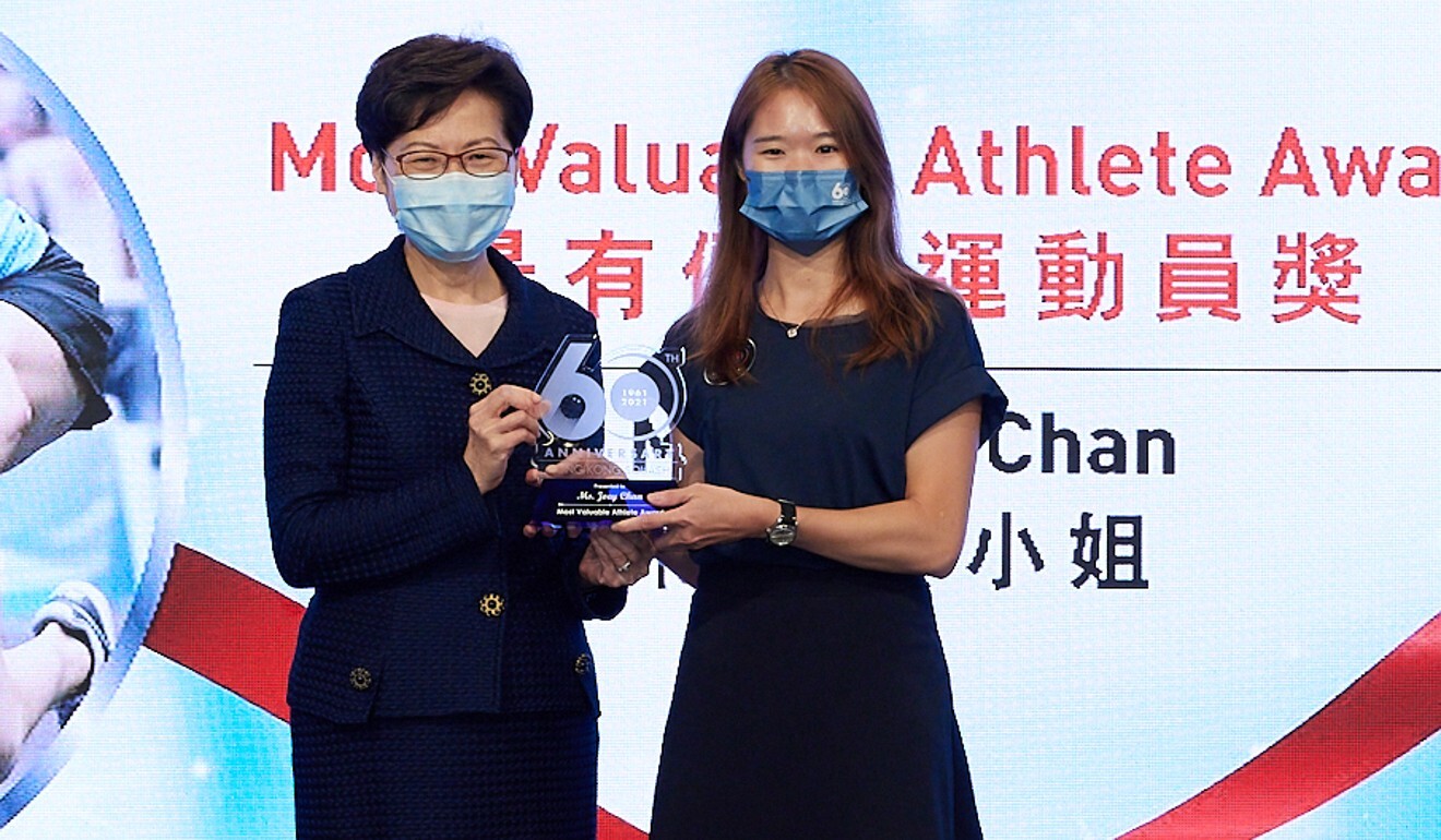 Joey Chan receives her Most Valuable Player trophy from Chief Executive Carrie Lam. Photo: Hong Kong Squash