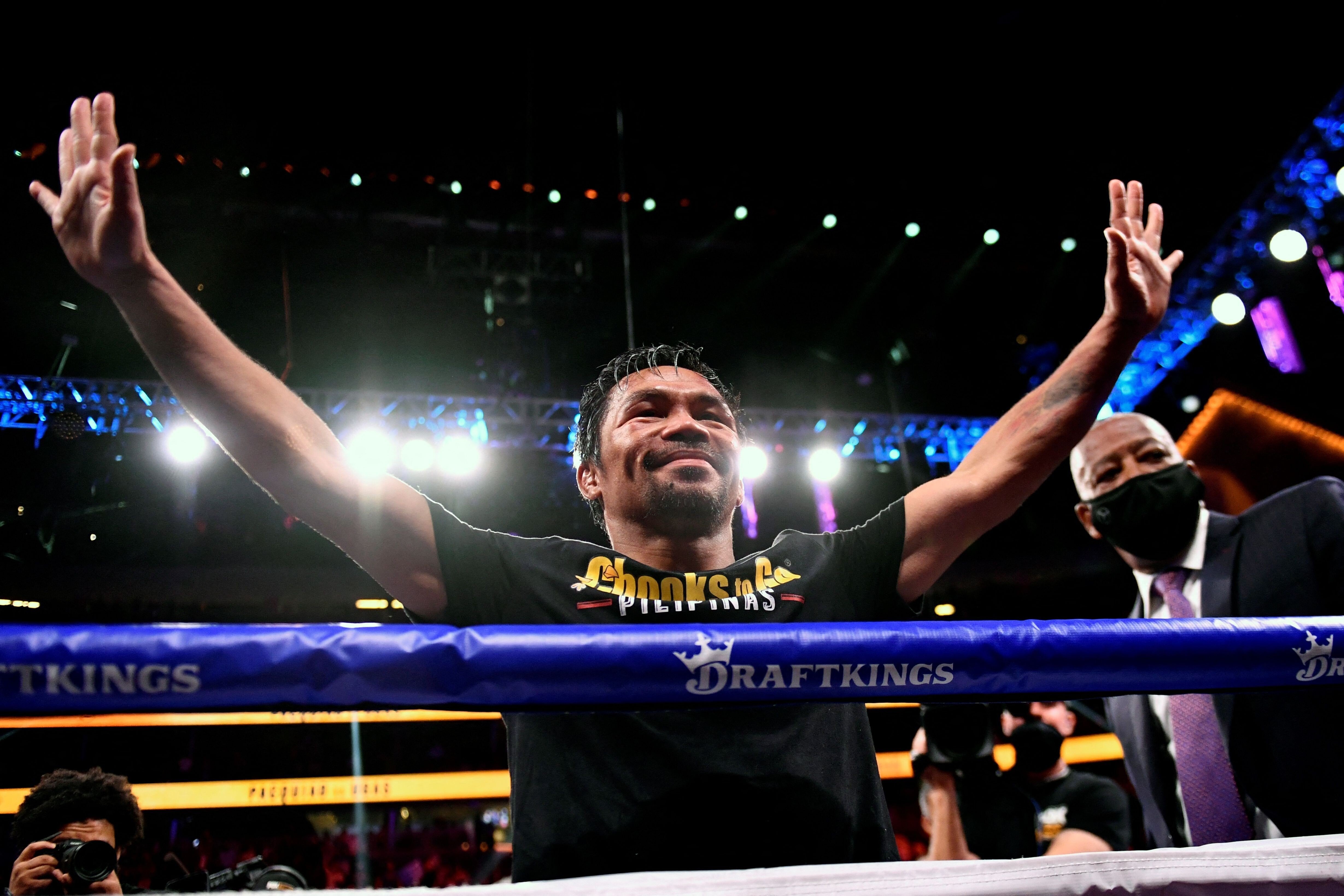 Manny Pacquiao waves at the crowd after losing against Yordenis Ugas. Photo: AFP