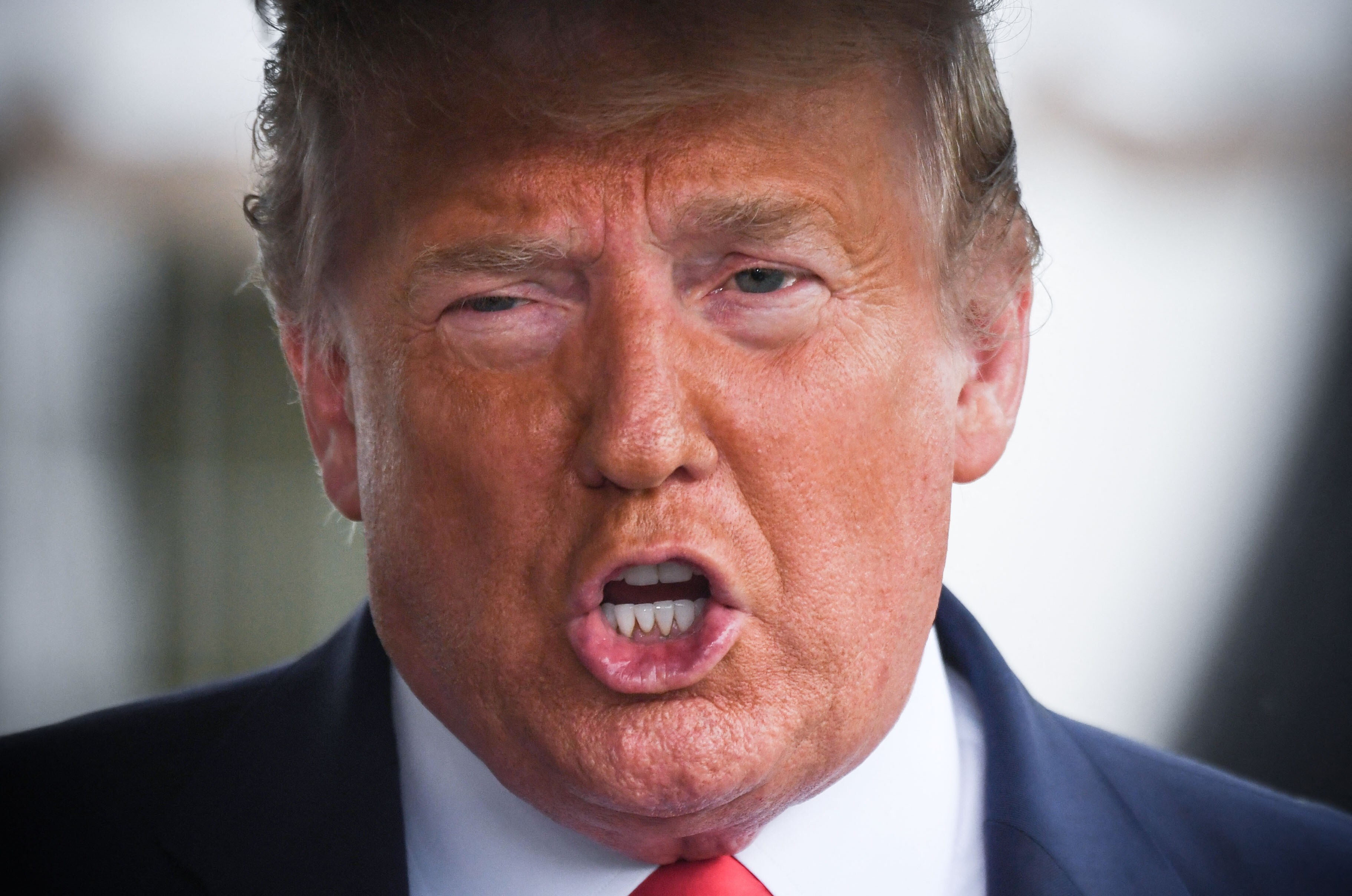 US President Donald Trump speaks to the press before departing the White House in June 2020. Photo: AFP