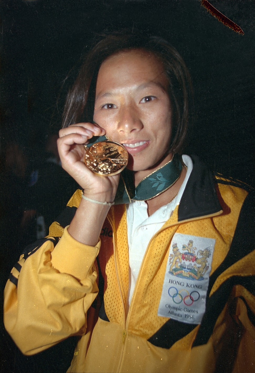 Lee Lai-shan shows off her gold medal at the 1996 Atlanta Olympics. Photo: SCMP Photo