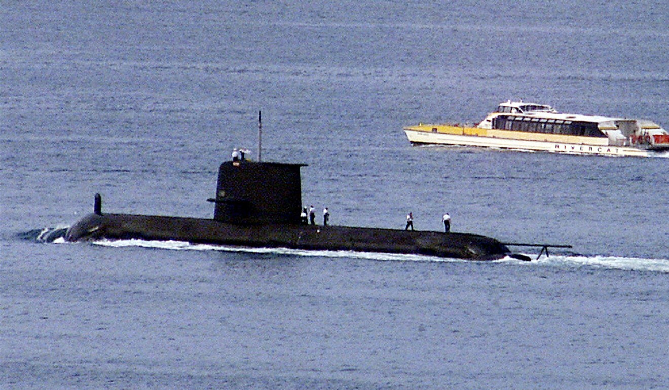 A Royal Australian Navy Collins-class submarine, HMAS Waller, is seen in Sydney Harbour. Australia will get nuclear-powered submarines as part of the Aukus deal. Photo: Handout