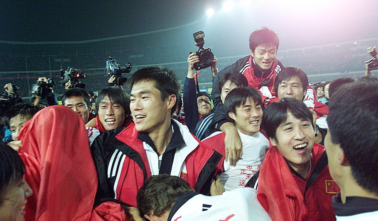 Chinese players celebrate on the pitch after a historic 1-0 victory over Oman in their 2002 Fifa World Cup qualifier. Photo: AFP