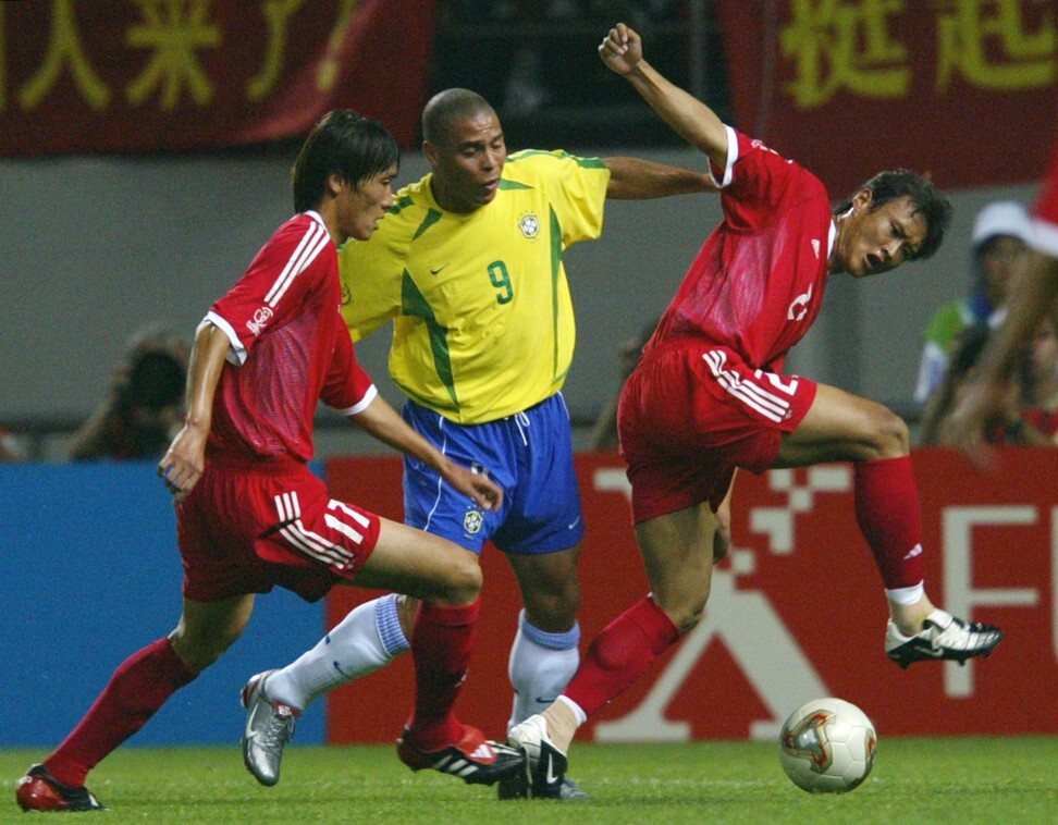Brazil’s Ronaldo (centre) vies for the ball with China’s Du Wei (left) and Xu Yunlong at the Jeju World Cup Stadium during first round group C action between Brazil and China in the 2002 Fifa World Cup. Photo: AFP