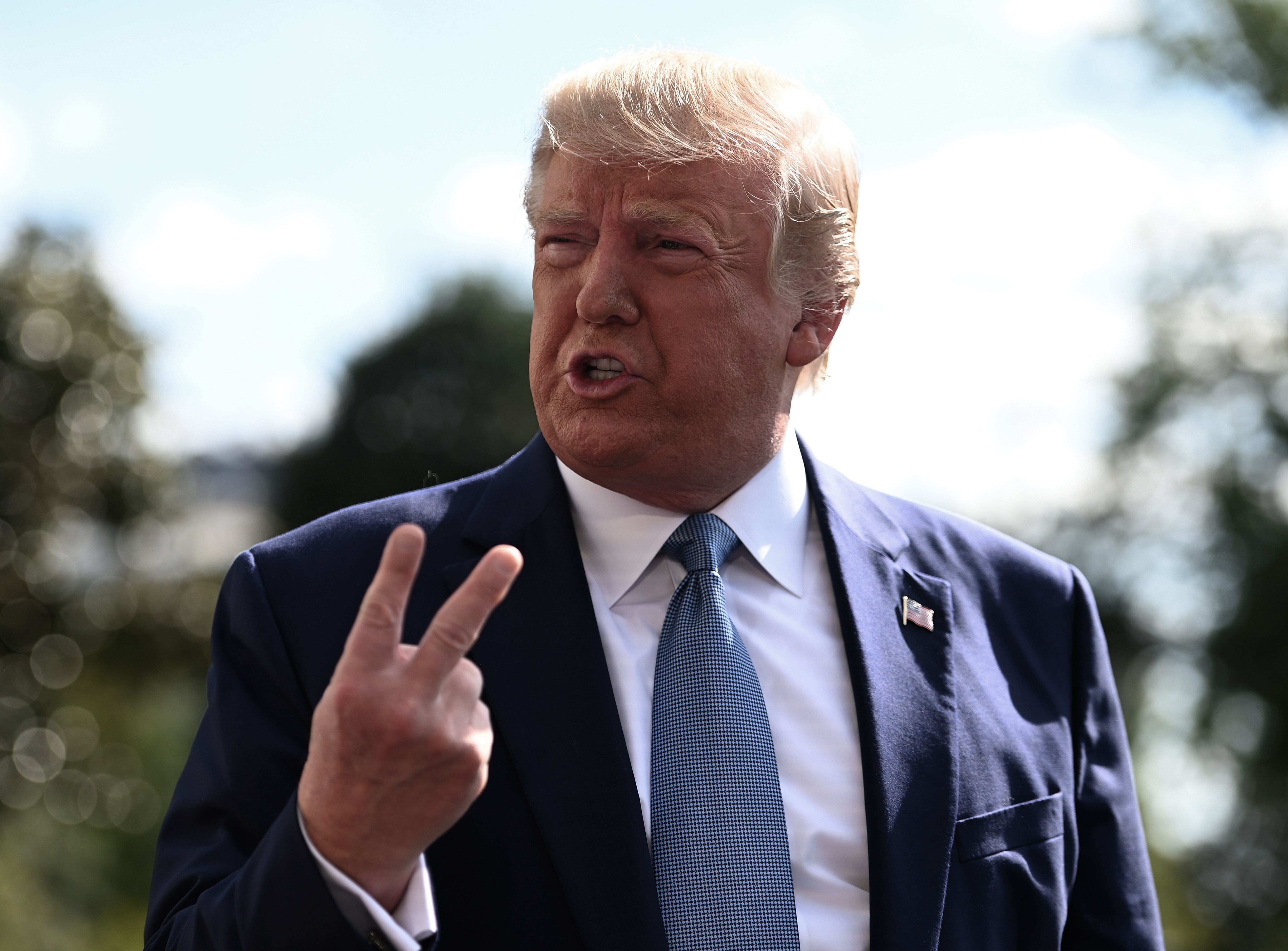 Donald Trump, pictured weeks before his November 2019 trip, talks to journalists on the South Lawn of the White House before travelling to Walter Reed National Military Medical Centre to visit injured military service members. File photo: AFP