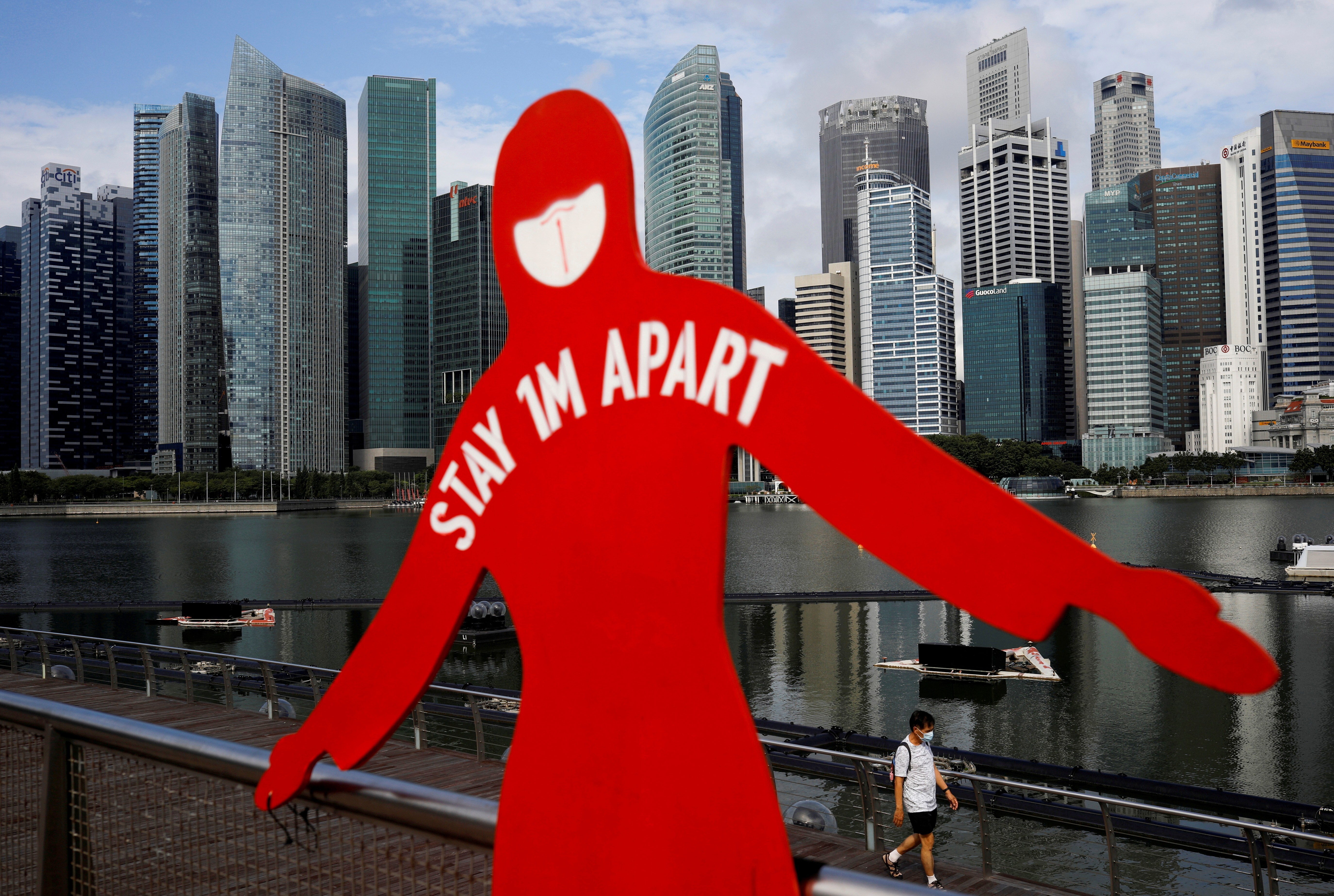 A sign to encourage social distancing in Singapore. Photo: Reuters