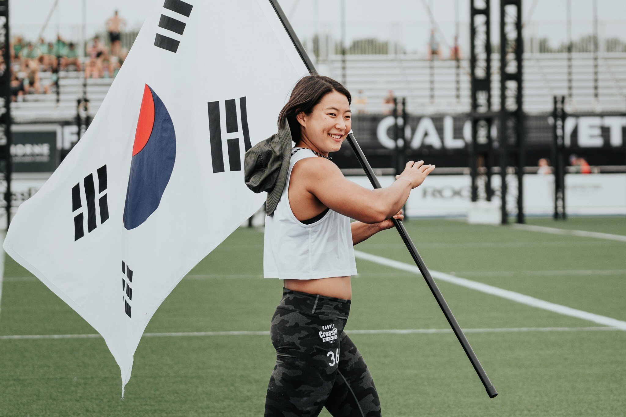Choi Seung-yeon parades the South Korean flag at the 2021 NOBULL CrossFit Games. Photos: Handout