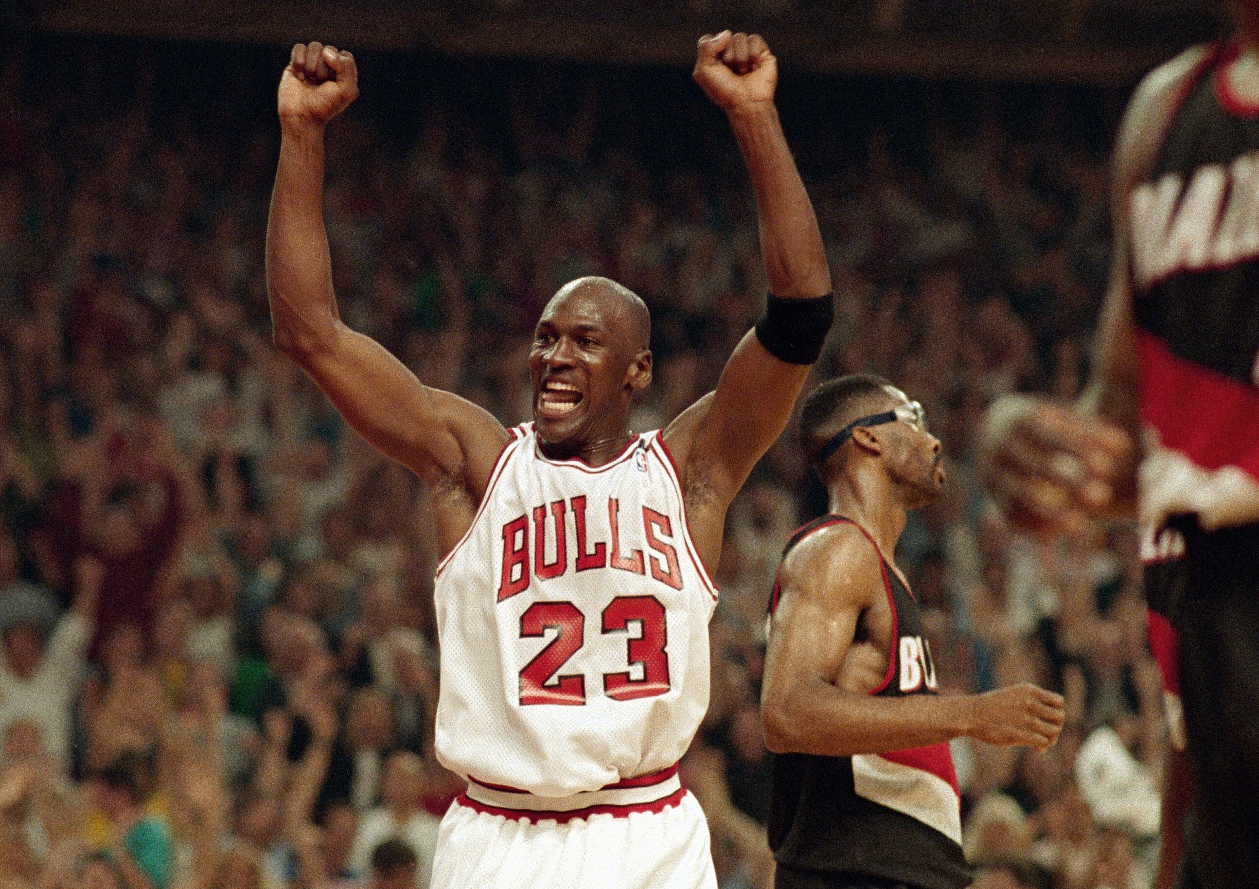Chicago Bulls superstar Michael Jordan celebrates a win over the Portland Trail Blazers in the 1992 NBA Finals in Chicago. Photo: AP