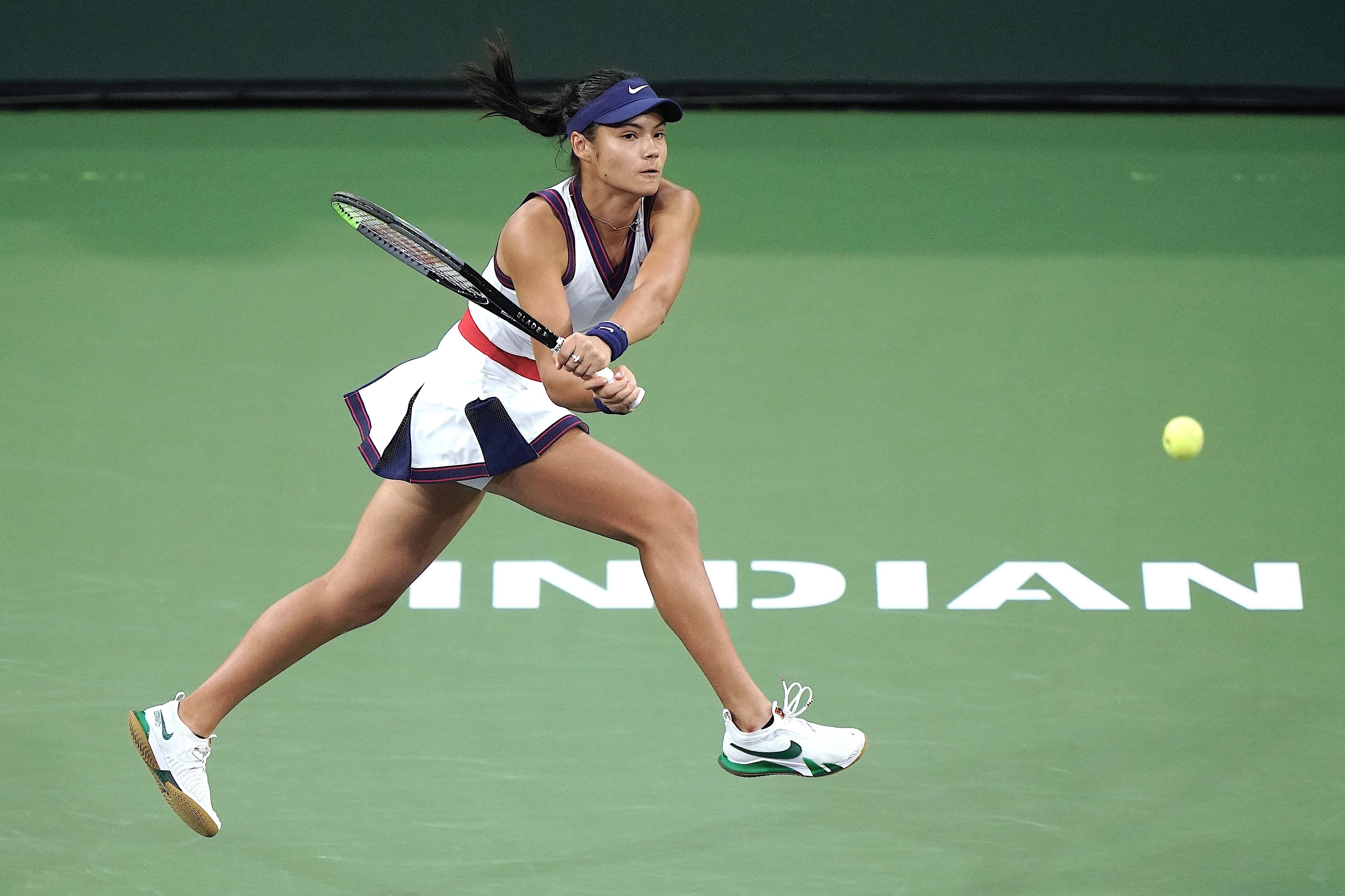 Emma Raducanu returns a shot to Alaksandra Sasnovich at the BNP Paribas Open tennis tournament at Indian Wells. Photo: AP