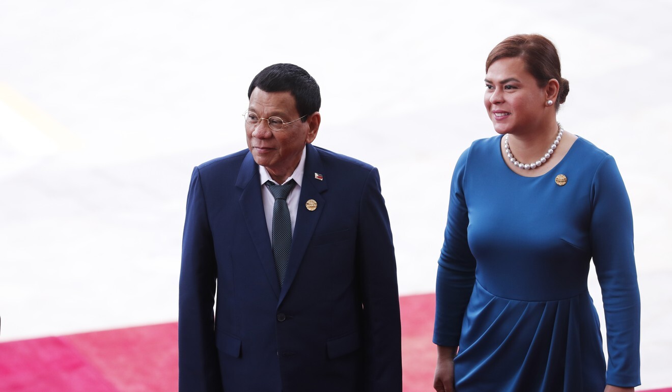 Philippine President Rodrigo Duterte and his daughter Sara Duterte. Photo: AFP