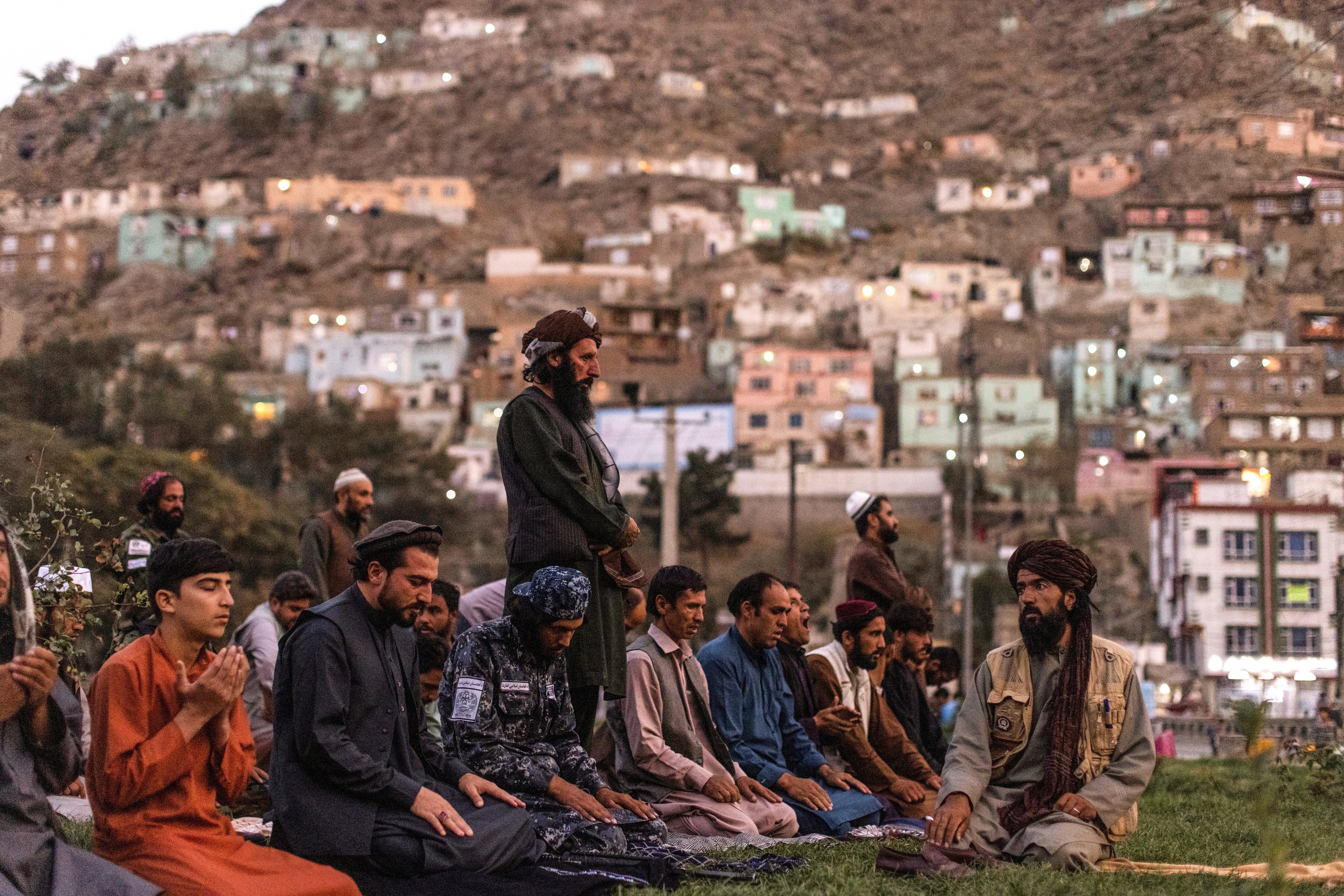 Taliban members pray in Kabul, Afghanistan, on Saturday. Photo: Reuters