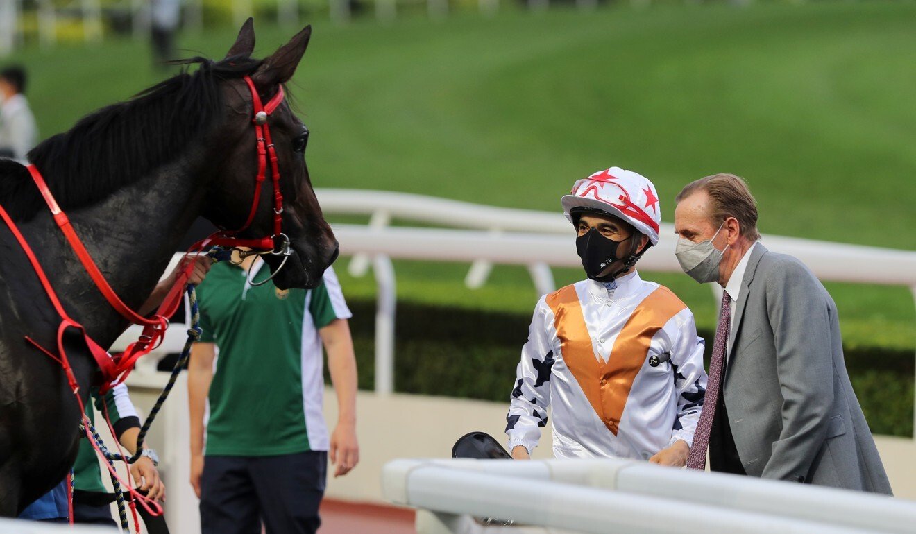 Joao Moreira and John Size look over Courier Wonder.