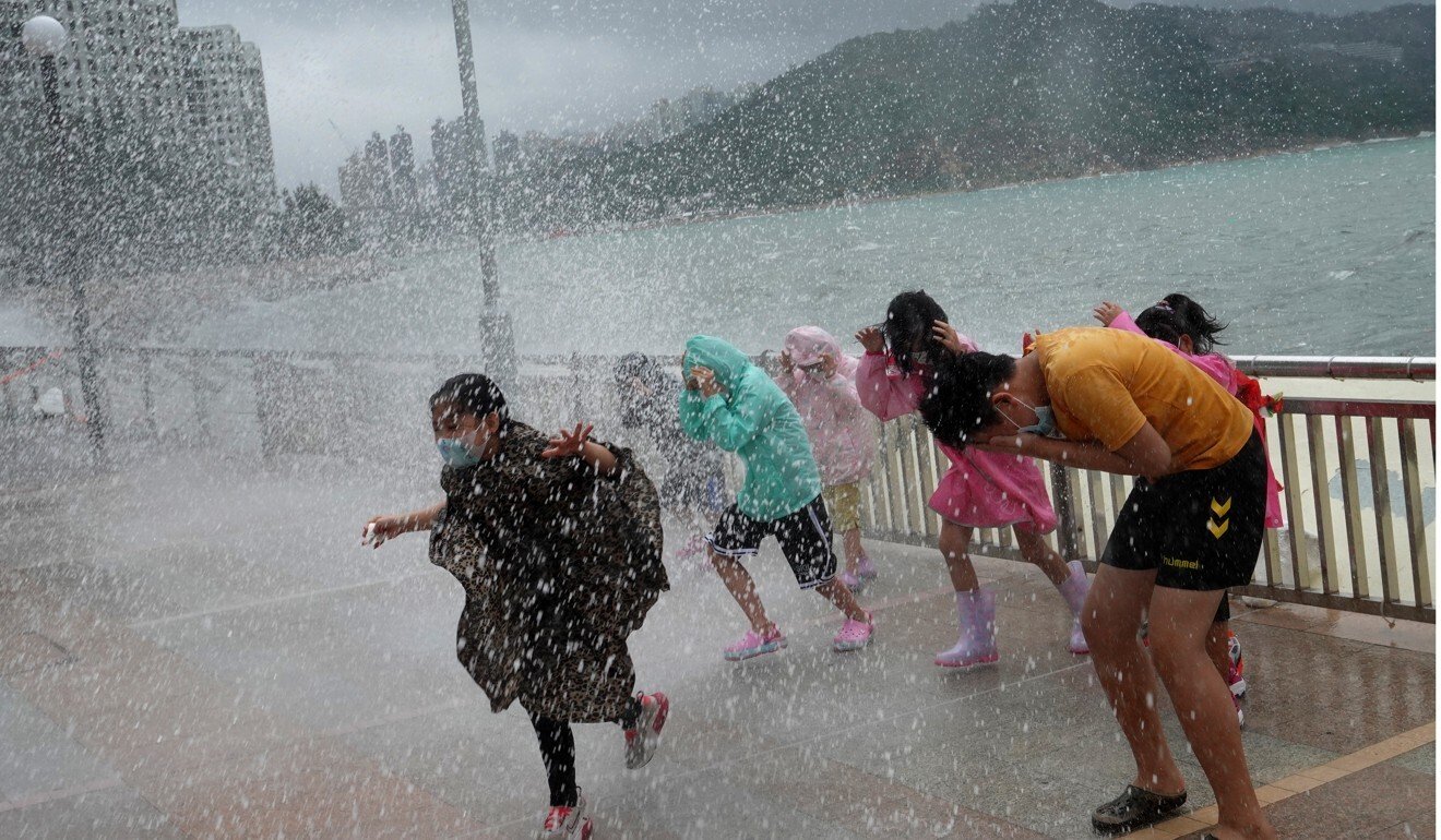 Residents share a lighthearted moment in Heng Fa Chuen in Chai Wan on Hong Kong Island. Photo: Winson Wong