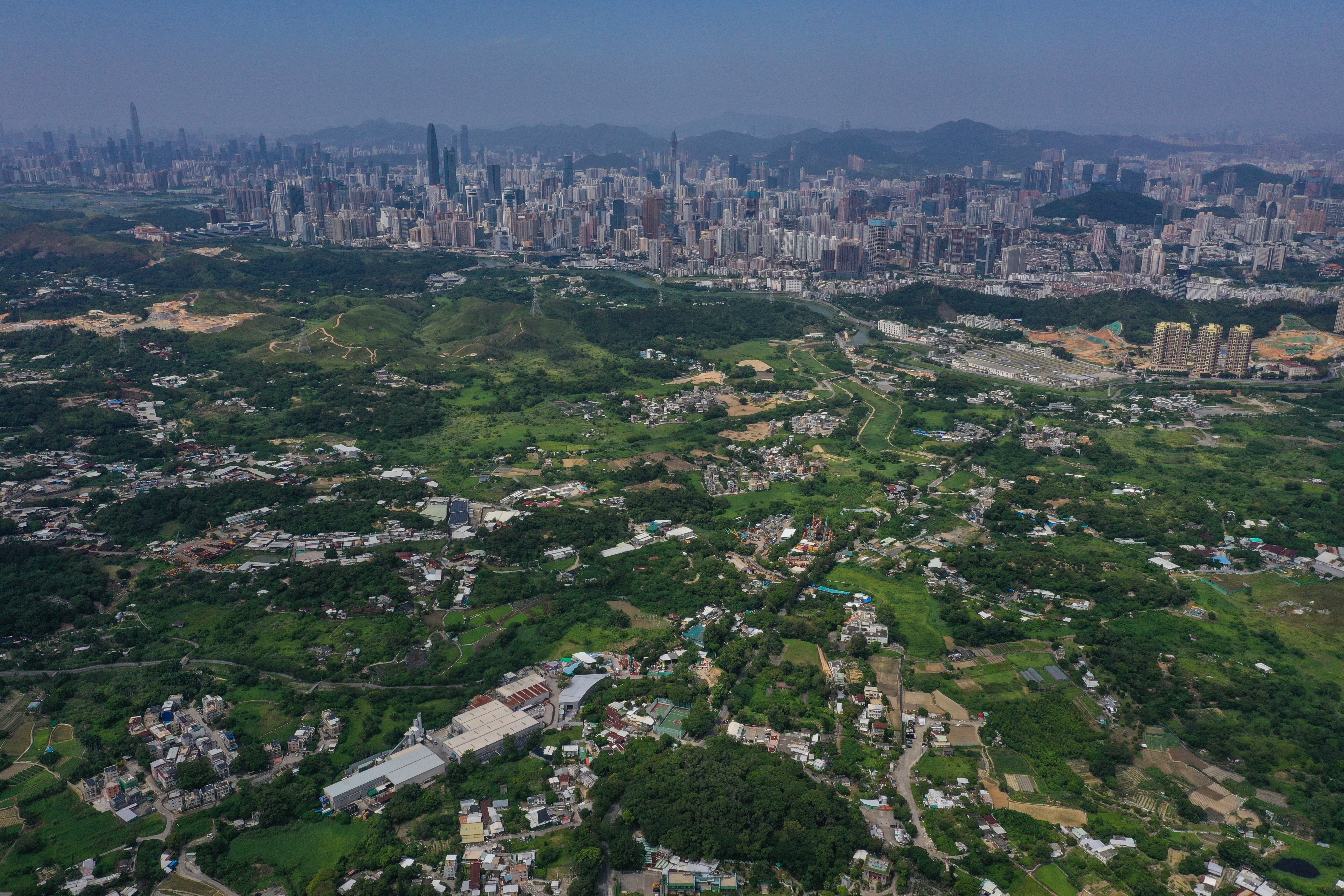 Hong Kong is planning to develop the northern New Territories, pictured with Shenzhen in the distance. Photo: Winson Wong