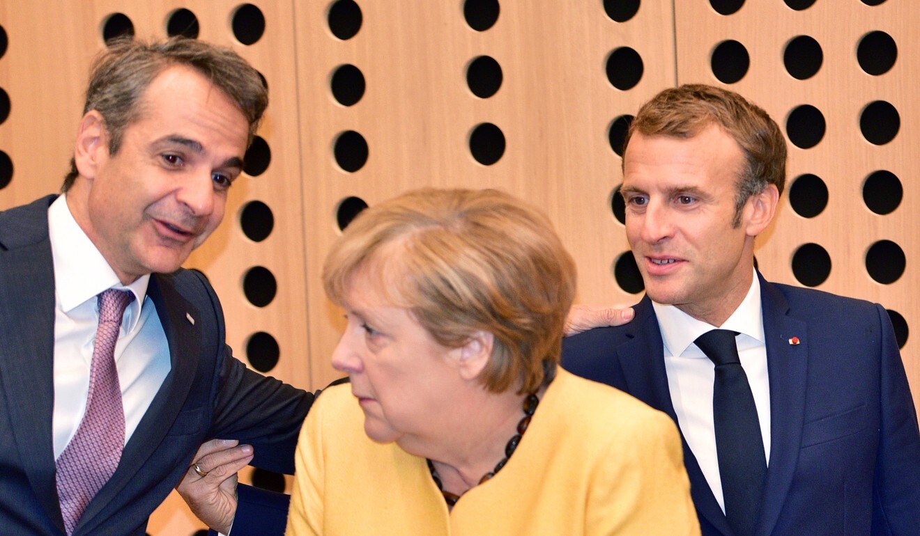 Greek Prime Minister Kyriakos Mitsotakis, German Chancellor Angela Merkel and French President Emmanuel Macron during a plenary session of the EU-Western Balkans summit in Brdo pri Kranju, in Kranj, Slovenia, on October 6. Photo:EPA-EFE