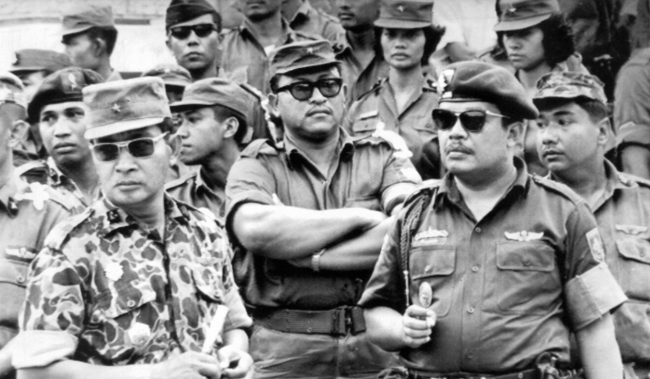 General Suharto, left, at the funeral service for the six generals killed in the failed 1965 coup. File photo