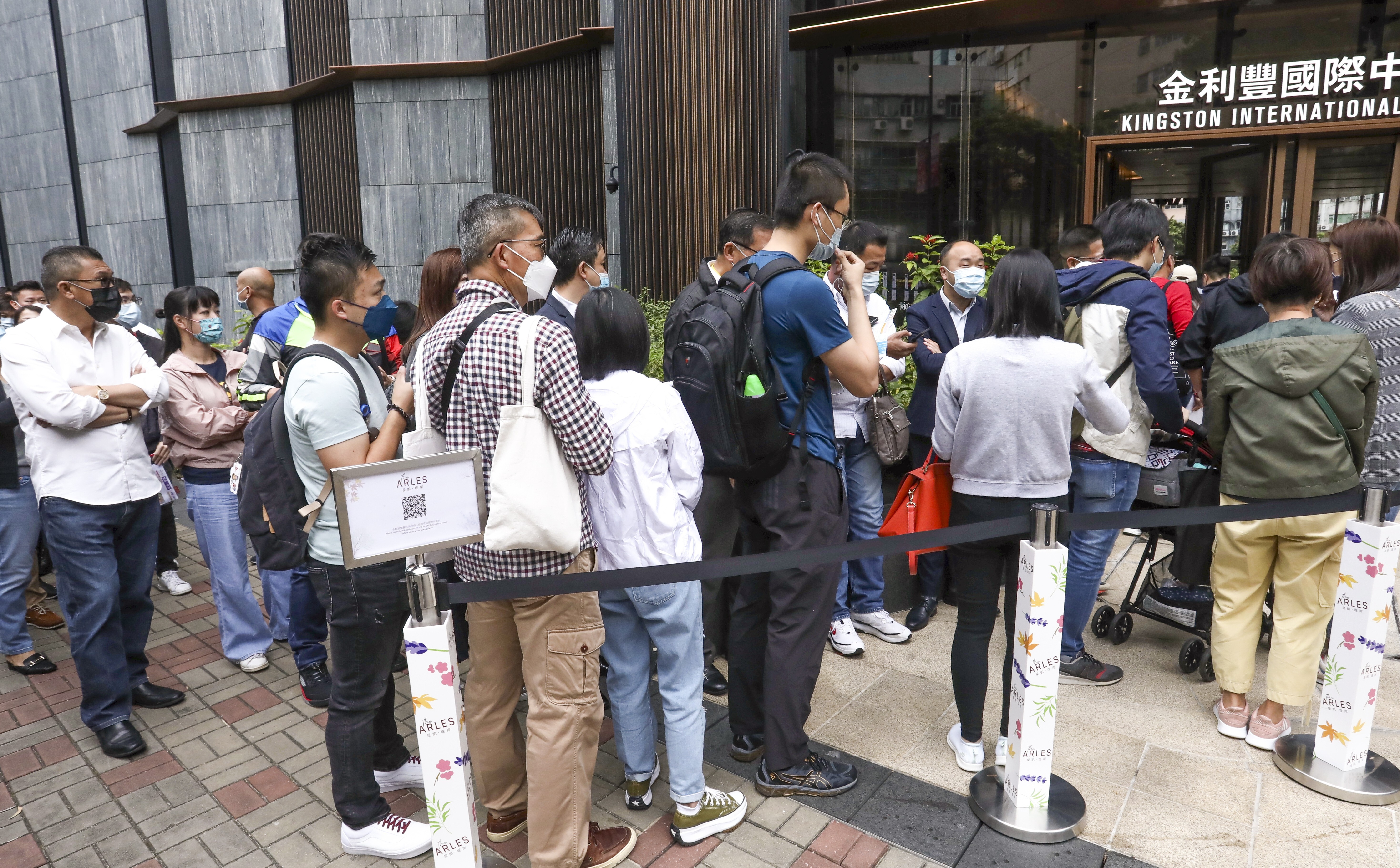 Property buyers queuing up for The Arles apartments in Sha Tin at the sales office of Centralcon Properties in Kowloon Bay on 23 October 2021. Photo: Jonathan Wong