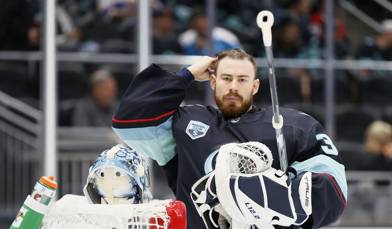 Philipp Grubauer of the Seattle Kraken has the hair, but does he have the right stuff to take Germany to the gold medal match? Photo: AFP