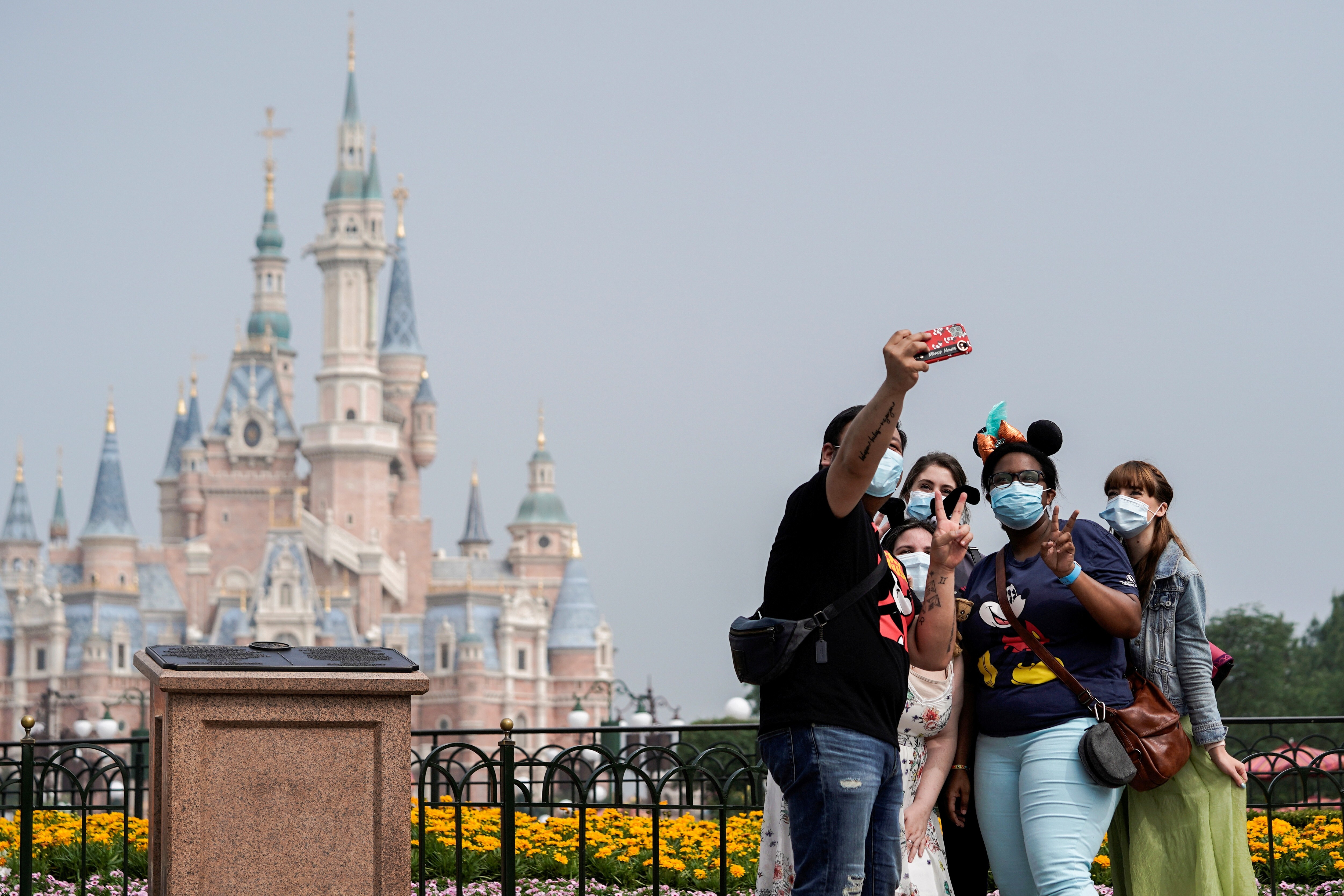 Shanghai Disneyland shut down on Sunday after it was linked to a Covid-19 case. It announced it would be closed on Monday and Tuesday but did not say when it would reopen. Photo: Reuters