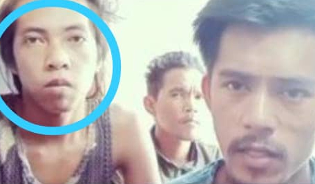 Brando Brayend Tewuh, right, who jumped from a Chinese fishing vessel to escape abuse. On the left, circled, is one of the men who jumped with him and is thought to have drowned in the attempt. Photo: Handout