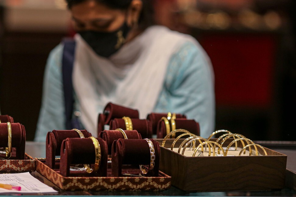 A woman shops at a jewellery store in Mumbai ahead of Diwali on November 2, 2021. Photo: Bloomberg