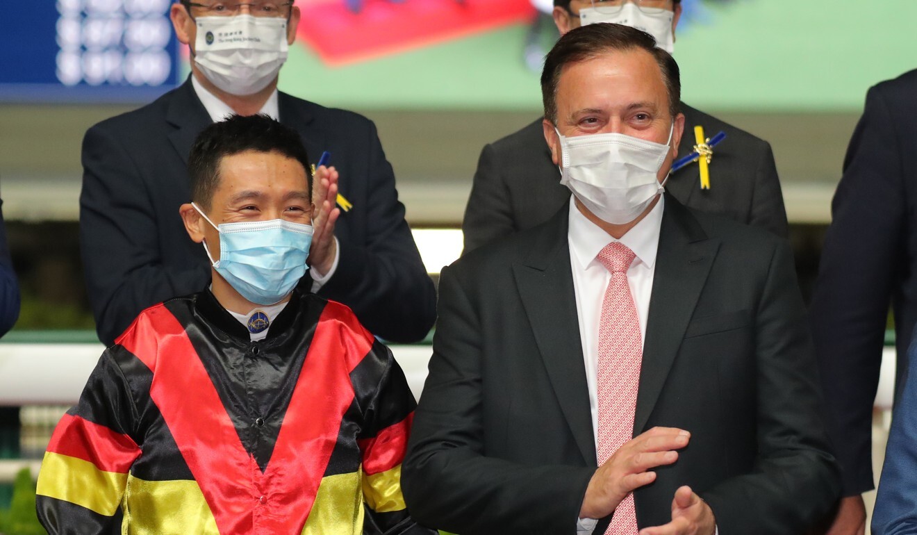 Jockey Vincent Ho and trainer Caspar Fownes enjoy Zebrowski’s win.