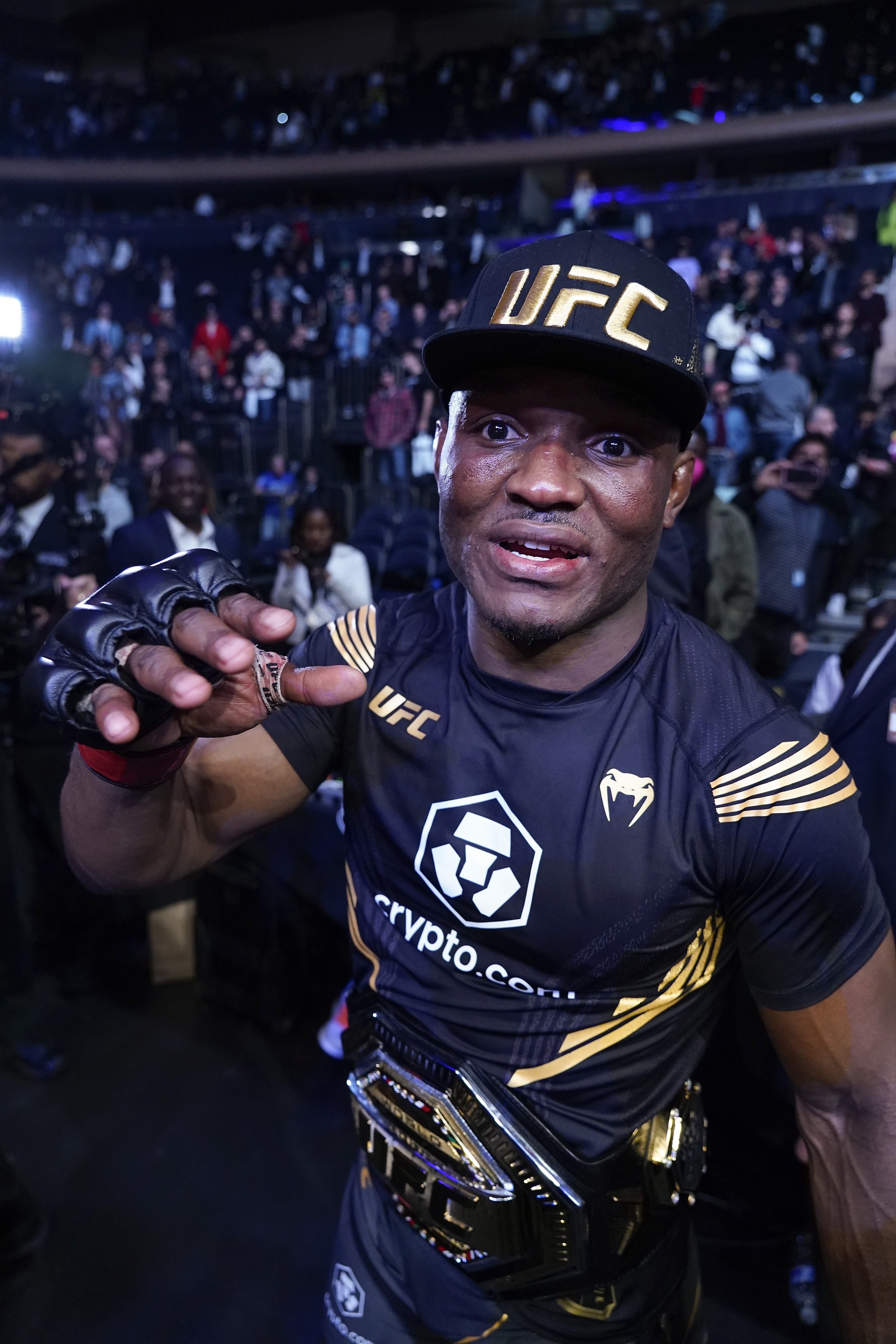 Kamaru Usman looks on from the Octagon after defeating Colby Covington in their welterweight title bout at UFC 268. Photos: AP