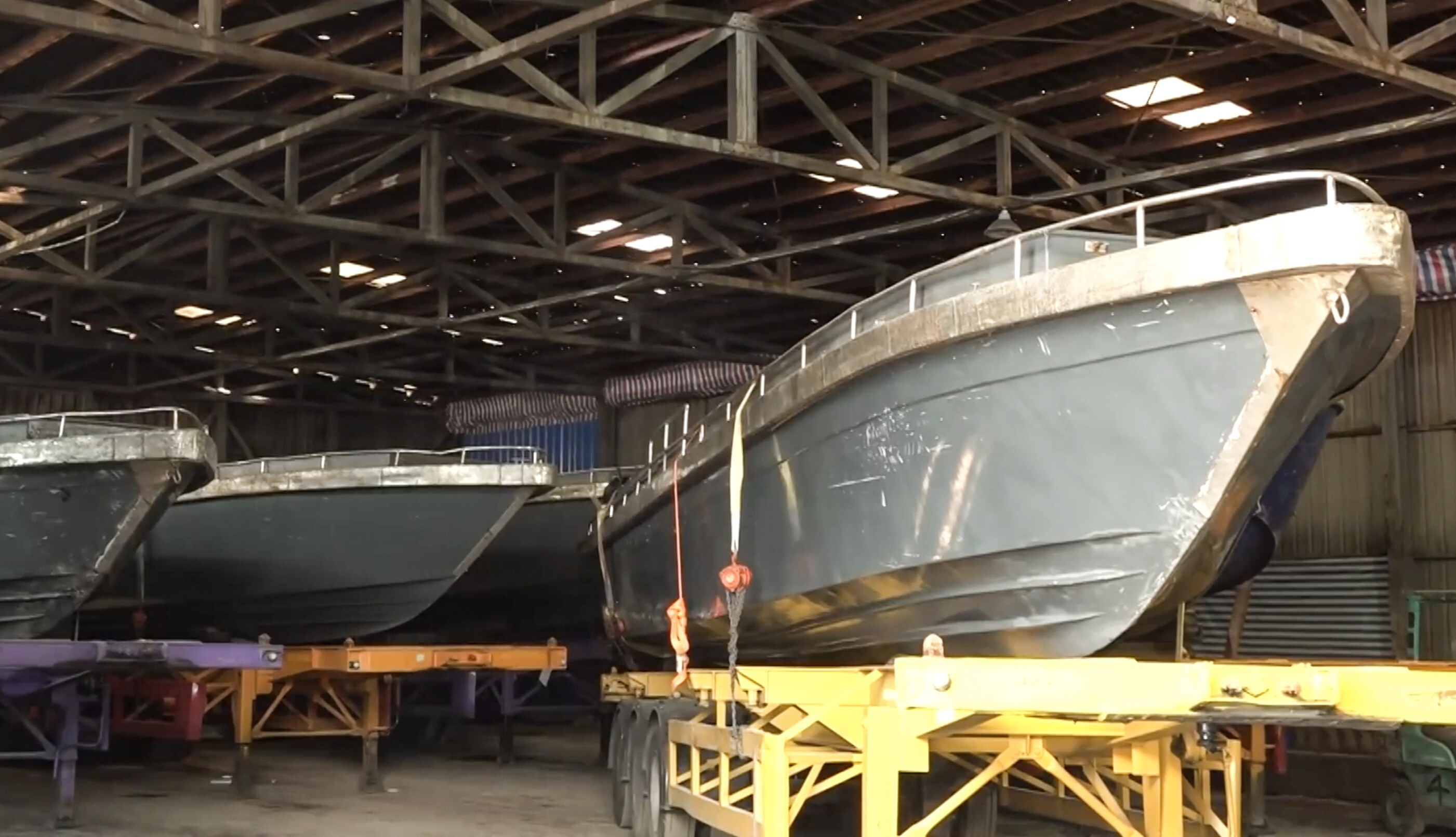 Hong Kong police seized 10 modified speedboats in a Thursday raid aimed at alleged smugglers. Photo: RTHK