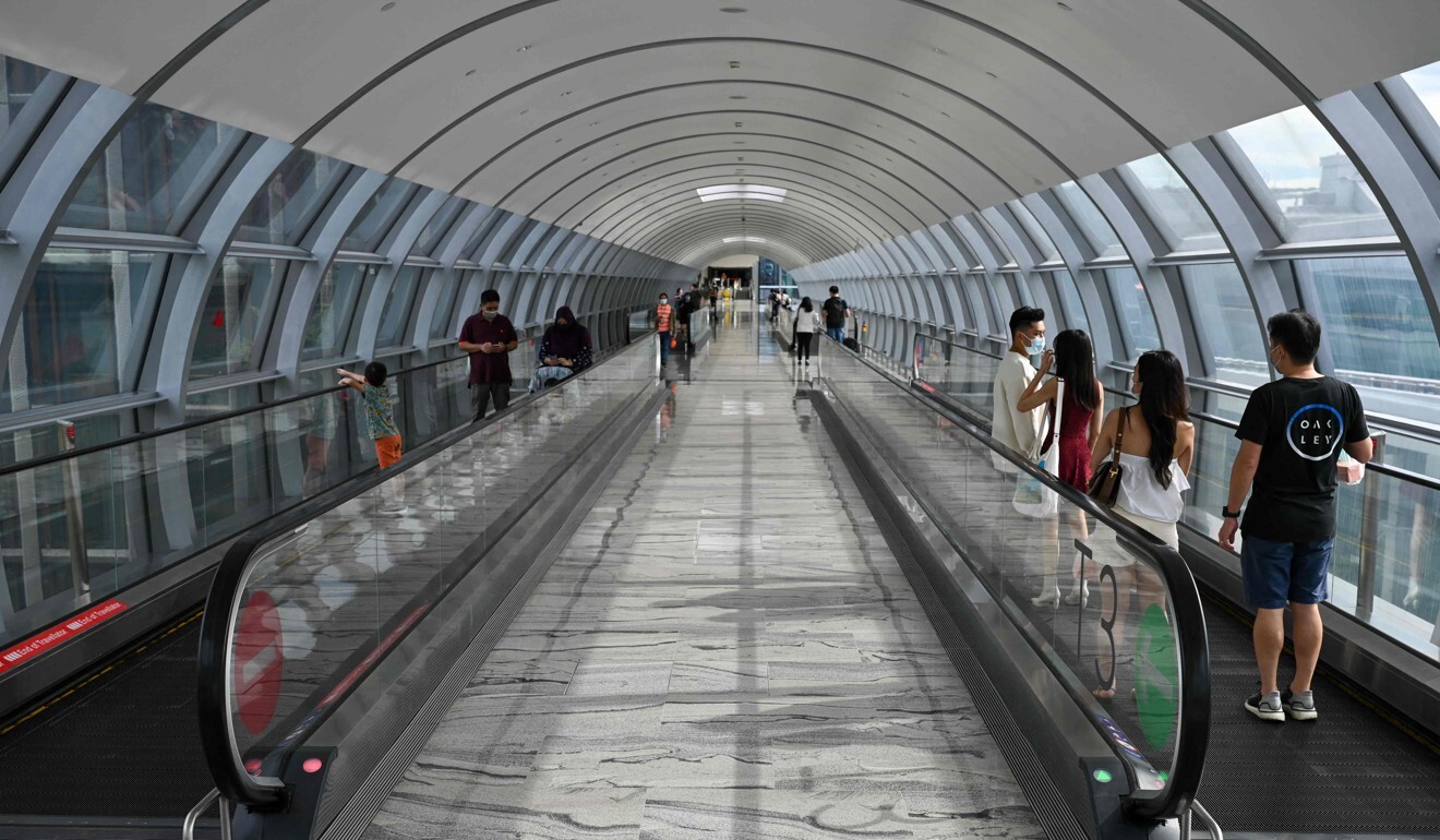 Travellers at Changi Airport in Singapore. Photo: AFP