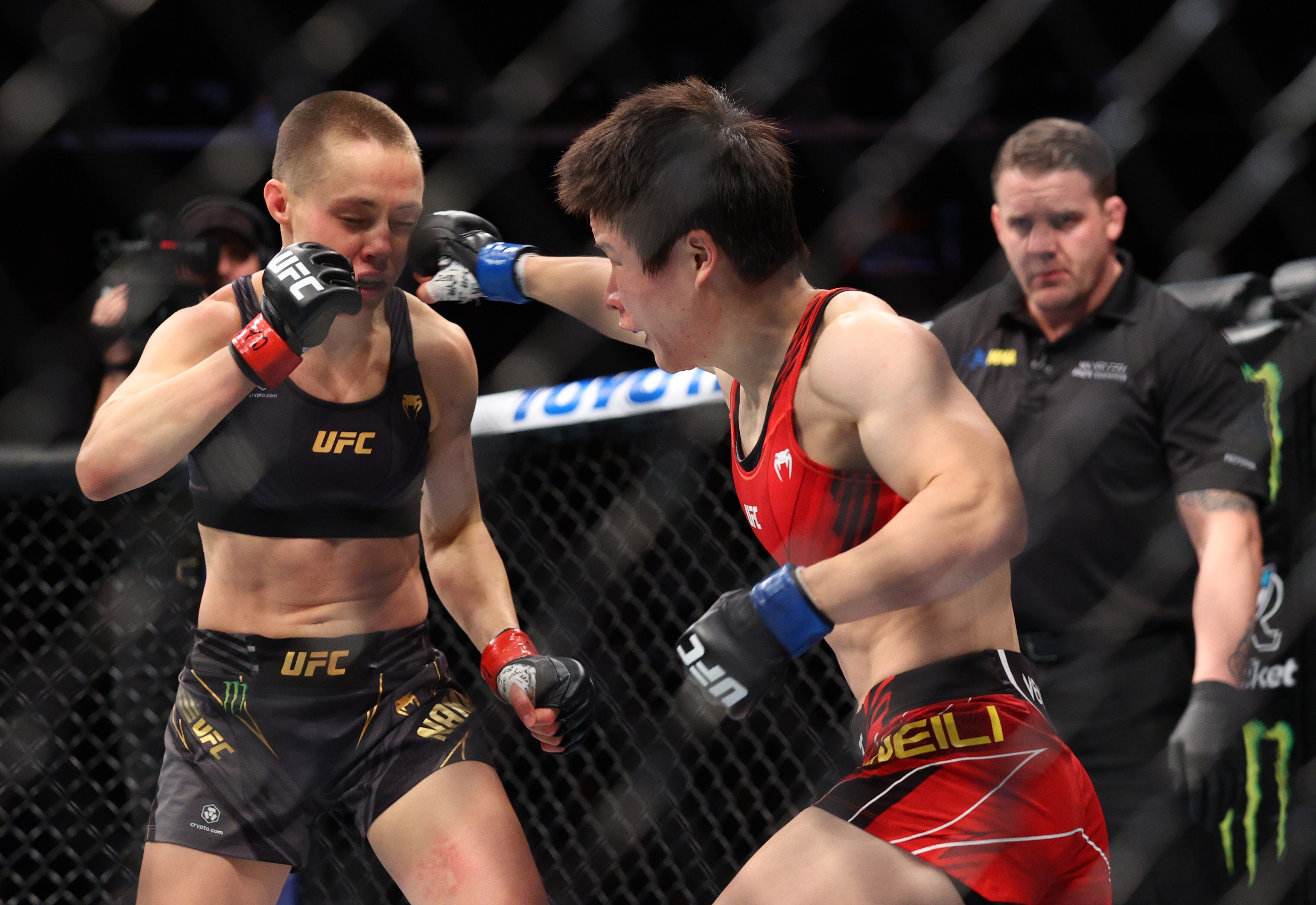 Zhang Weili throws a punch at Rose Namajunas during UFC 268 at Madison Square Garden. Photo: Ed Mulholland/USA TODAY Sports