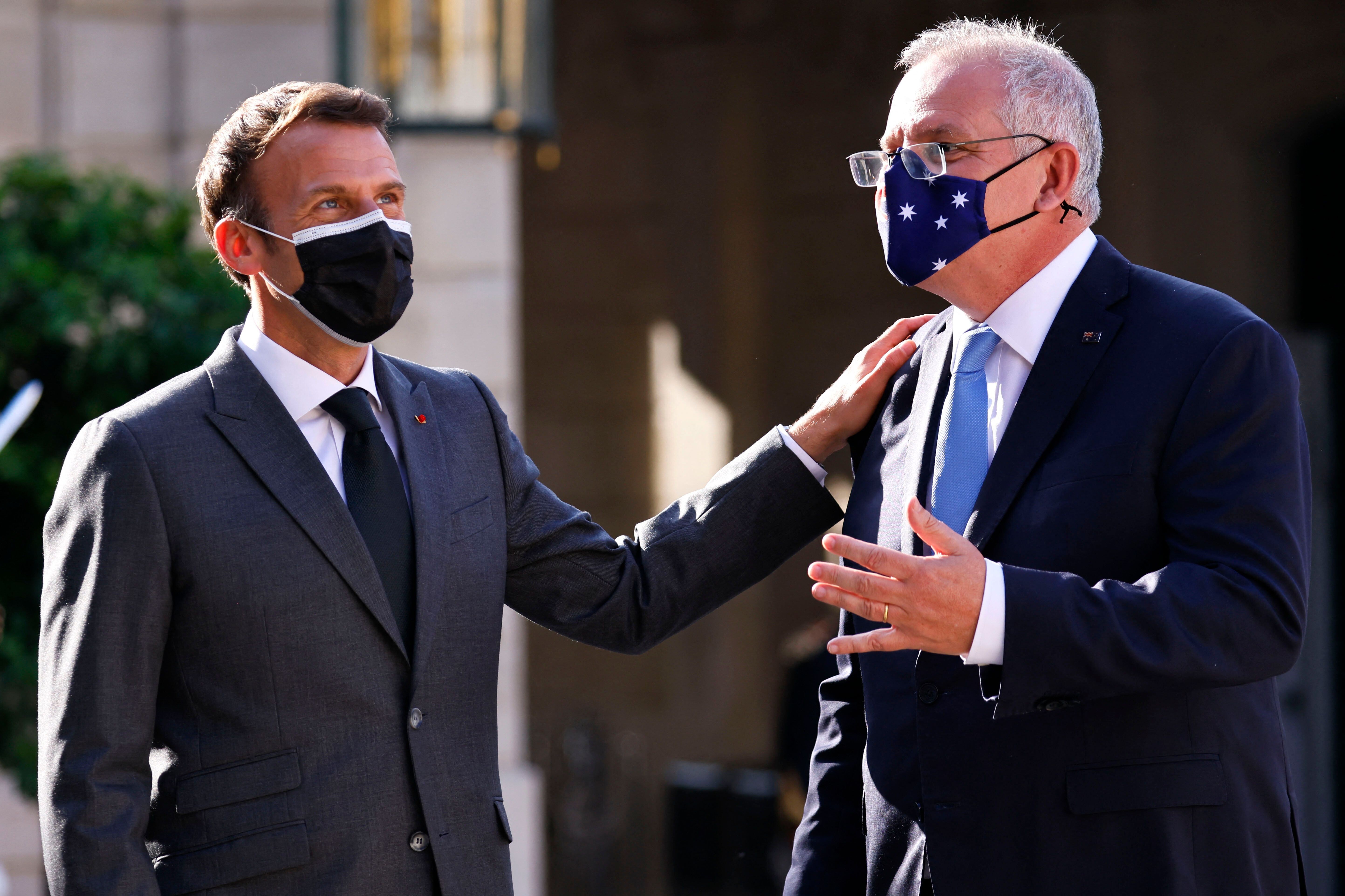 French President Emmanuel Macron greets Australia’s Prime Minister Scott Morrison at the Elysee Palace on June 15, 2021. Photo: AFP