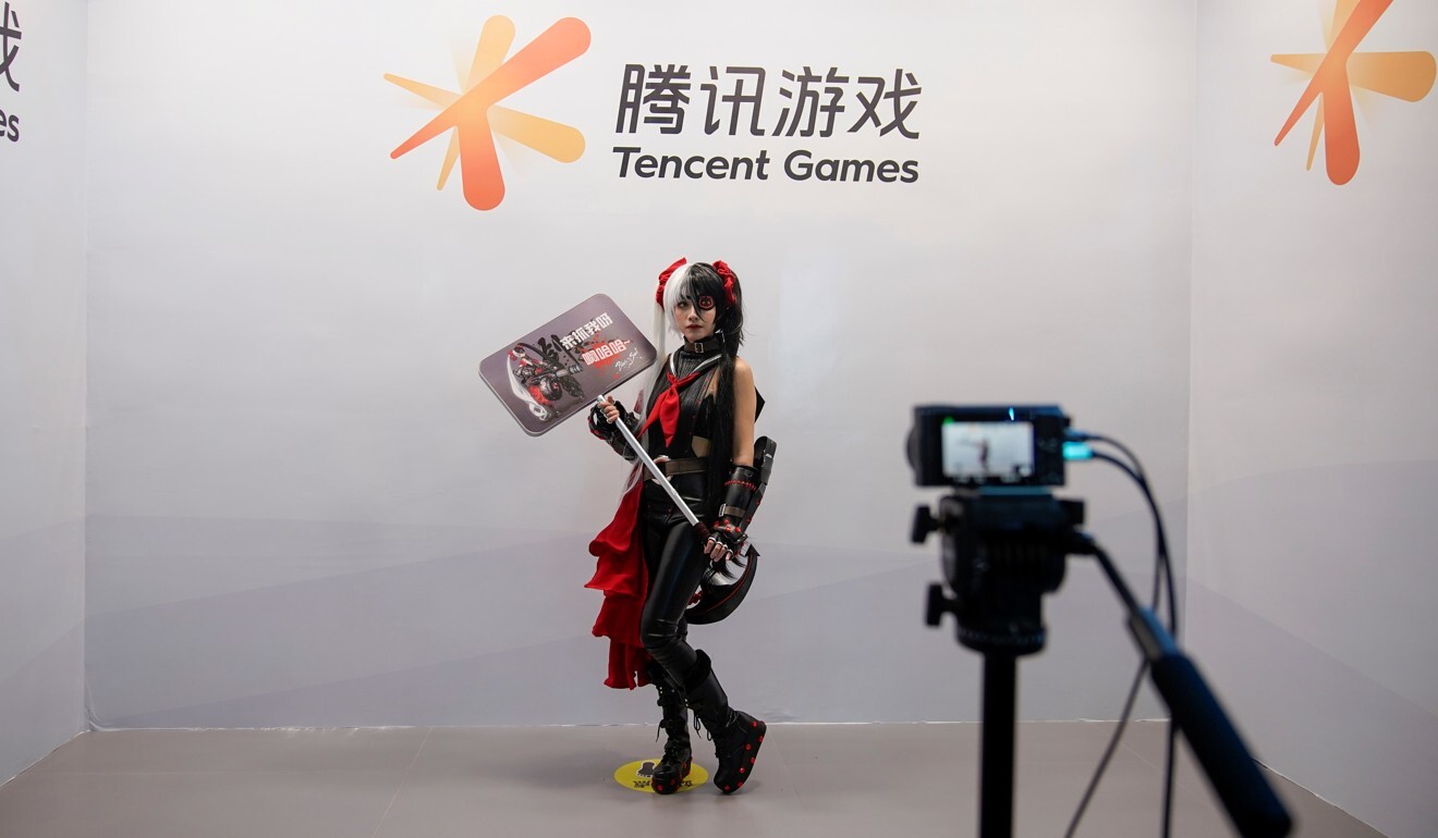A cosplay fan poses for a photo at a Tencent Games booth during the China Digital Entertainment Expo and Conference, July 30, 2021. Photo: Reuters