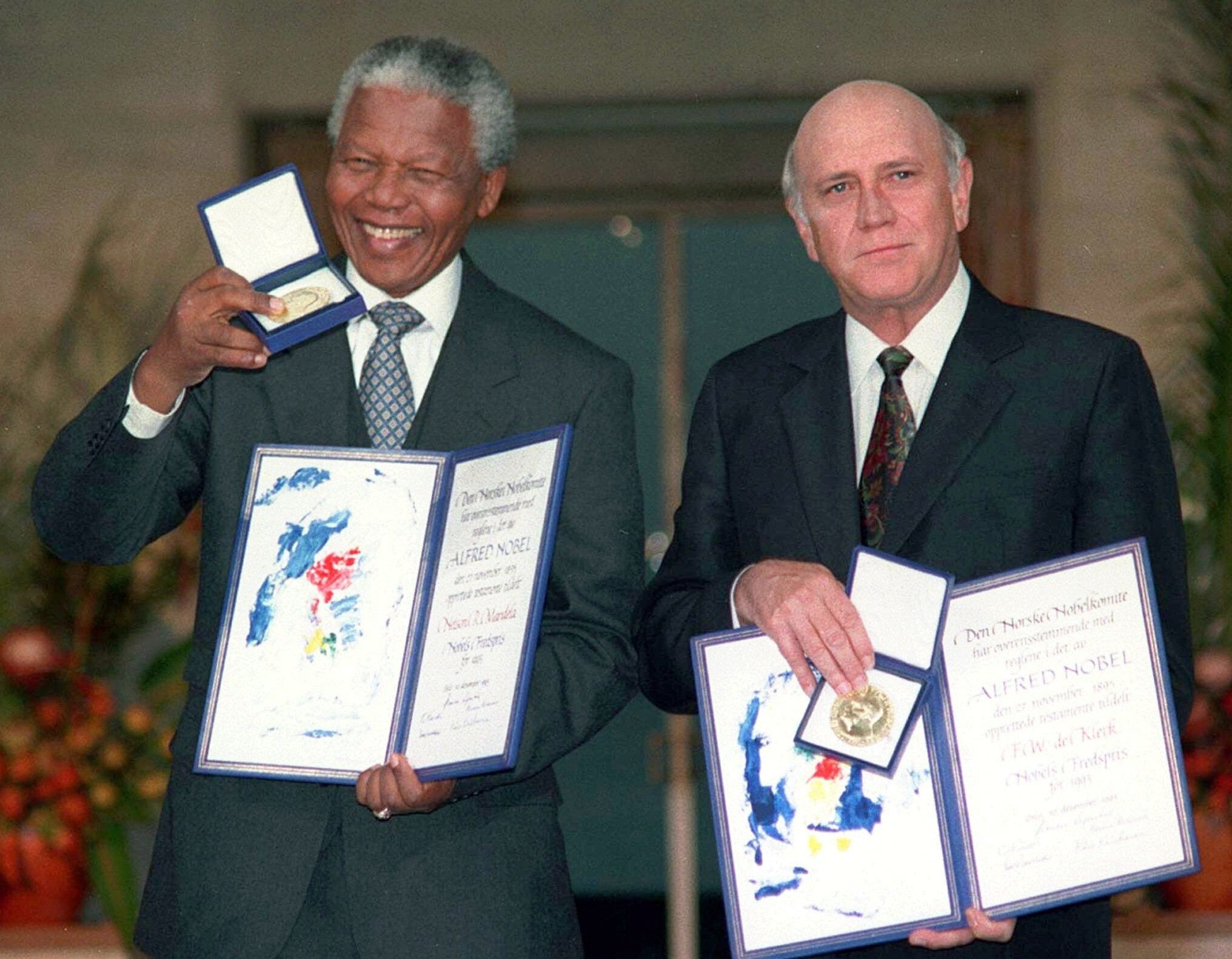 Then South African Deputy President FW de Klerk, right, and South African President Nelson Mandela pose with their Nobel Peace Prize medals in 1993. File photo: AP