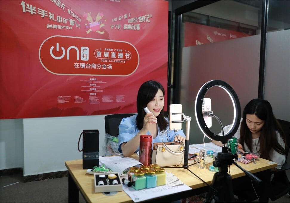 A key opinion leader (KOL) peddling products during a live-streaming videocast in Guangzhou on June 7, 2020. Photo: Xinhua
