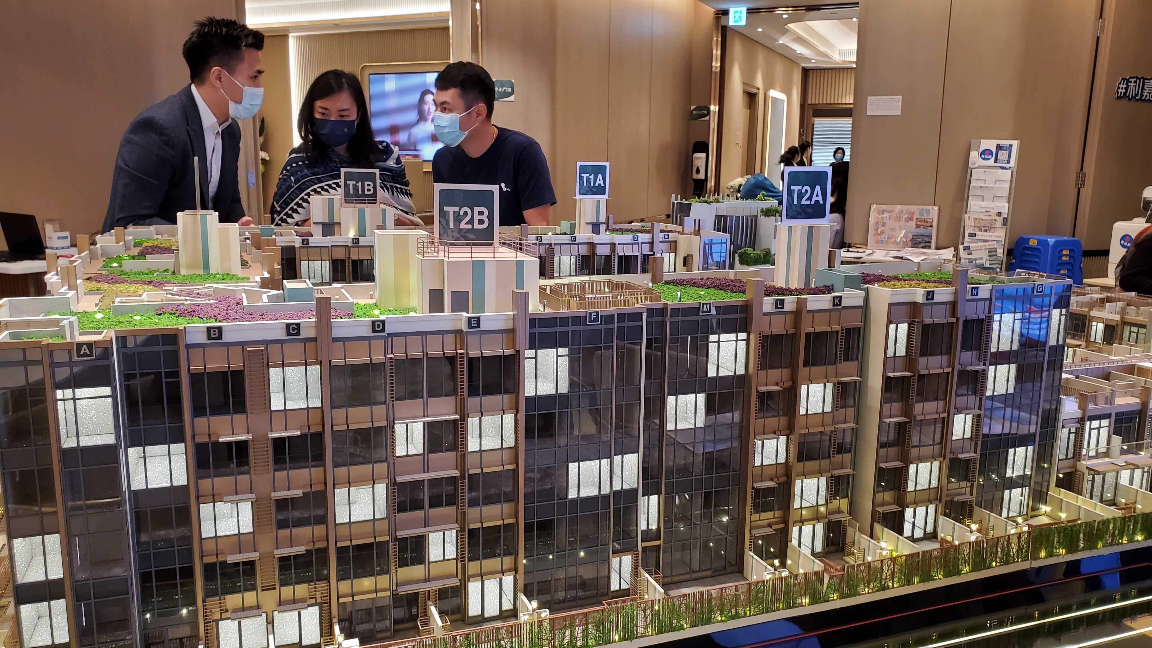 Buyers viewing a model of the #Lyos flats in Hung Shui Kiu at CK Asset Holdings’ sales office in Hung Hom on 4 November 21. Photo: Edmond So