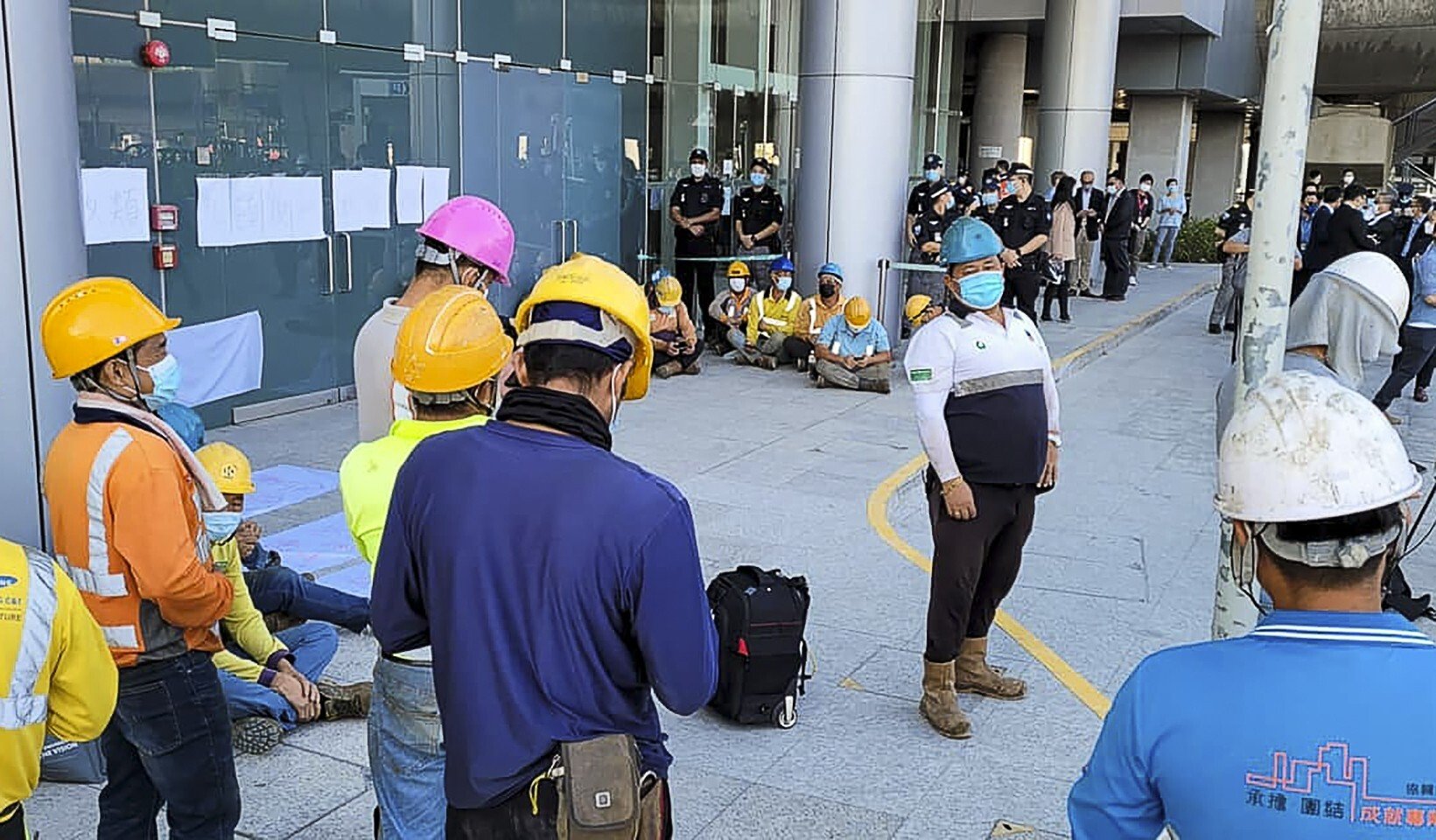 Workers involved in building a new terminal for Hong Kong International Airport’s planned third runway stage a protest on Tuesday. Photo: Facebook